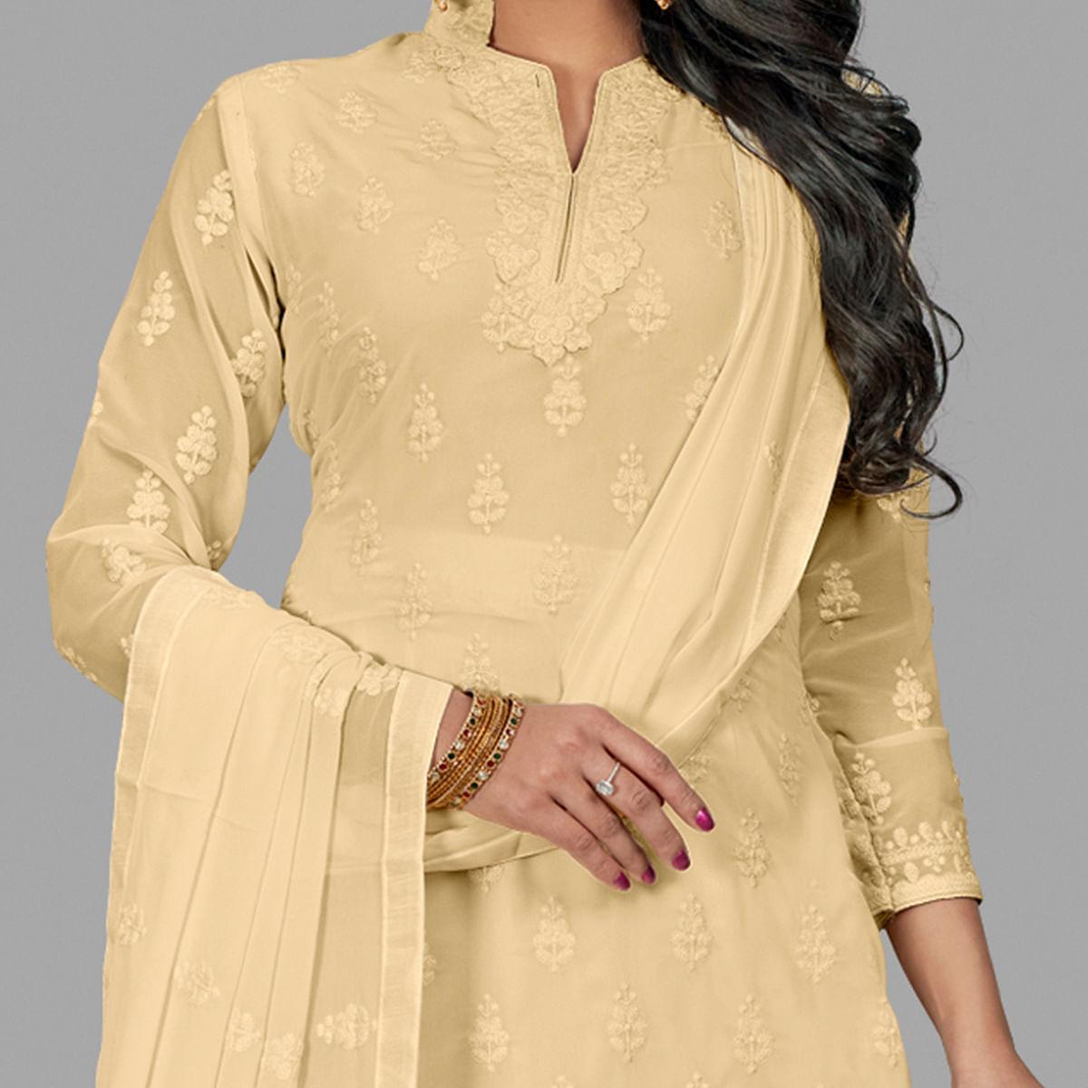 Beautiful Cream Colored Party Wear Embroidered Faux Georgette Palazzo Suit - Peachmode