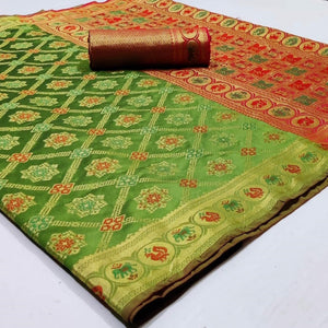 Beautiful Green Colored Festive Wear Woven Silk Saree - Peachmode