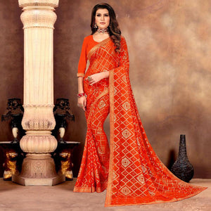 Beautiful Orange Colored Festive Wear Bandhani Print With Gotta Border Heavy Georgette Saree - Peachmode
