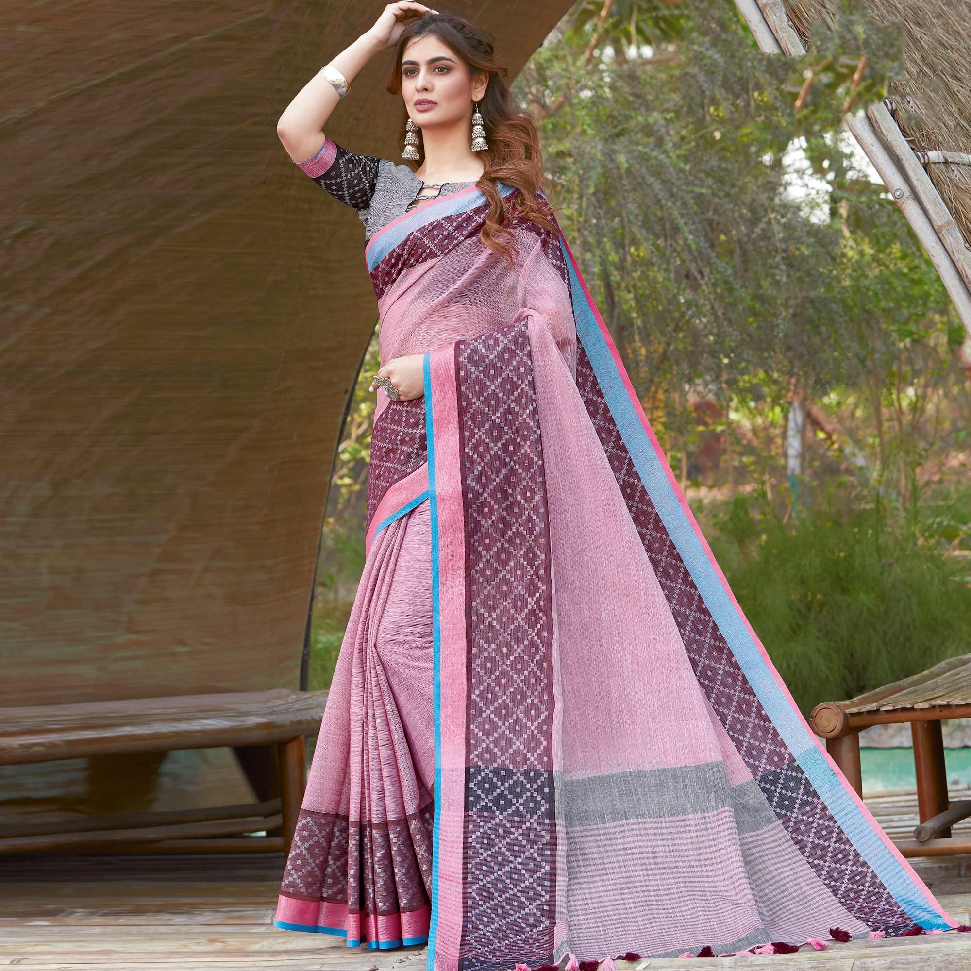 Beautiful Pink Colored Festive Wear Woven Linen Saree - Peachmode