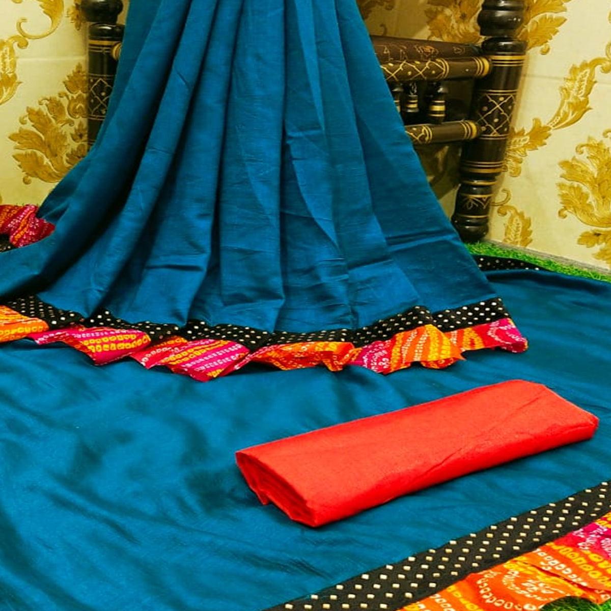 Beautiful Rama Colored Partywear Solid Vichitra Silk Saree With Bandhani Print Ruffle - Peachmode