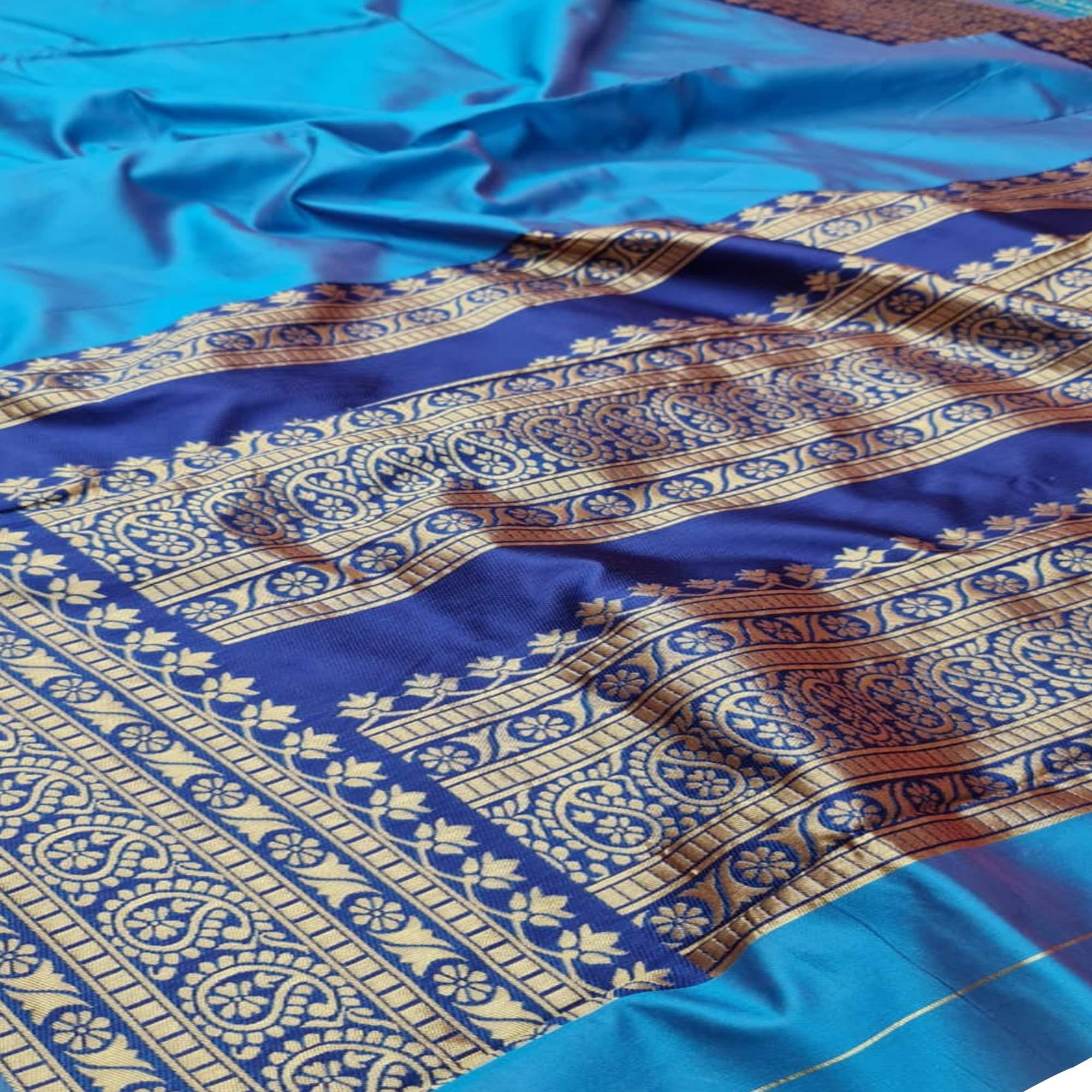 Beautiful Turquoise Blue Colored Festive Wear Woven Soft Lichi Silk Saree - Peachmode