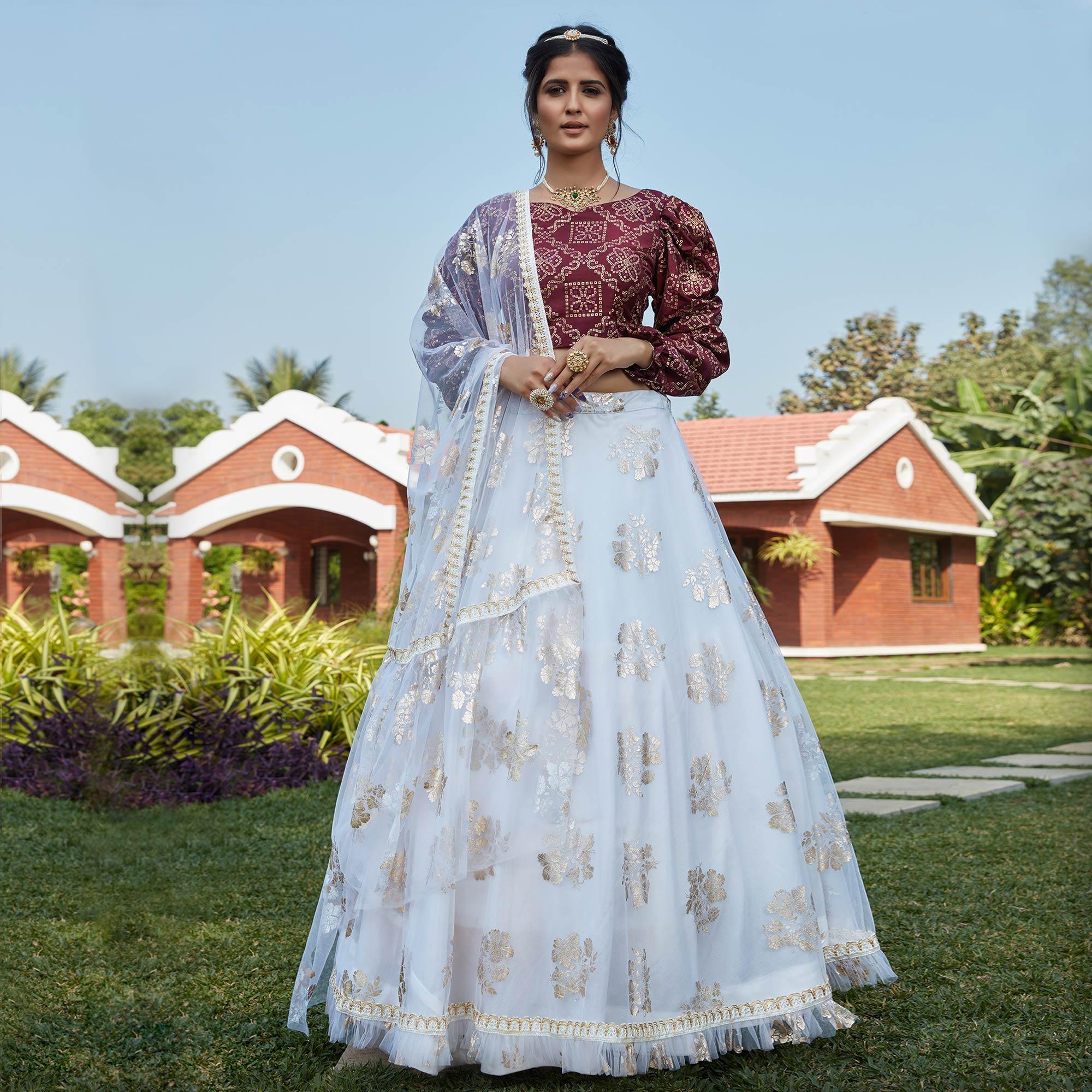 Beautiful White Coloured Metallic Foil Printed Net Lehenga Choli - Peachmode