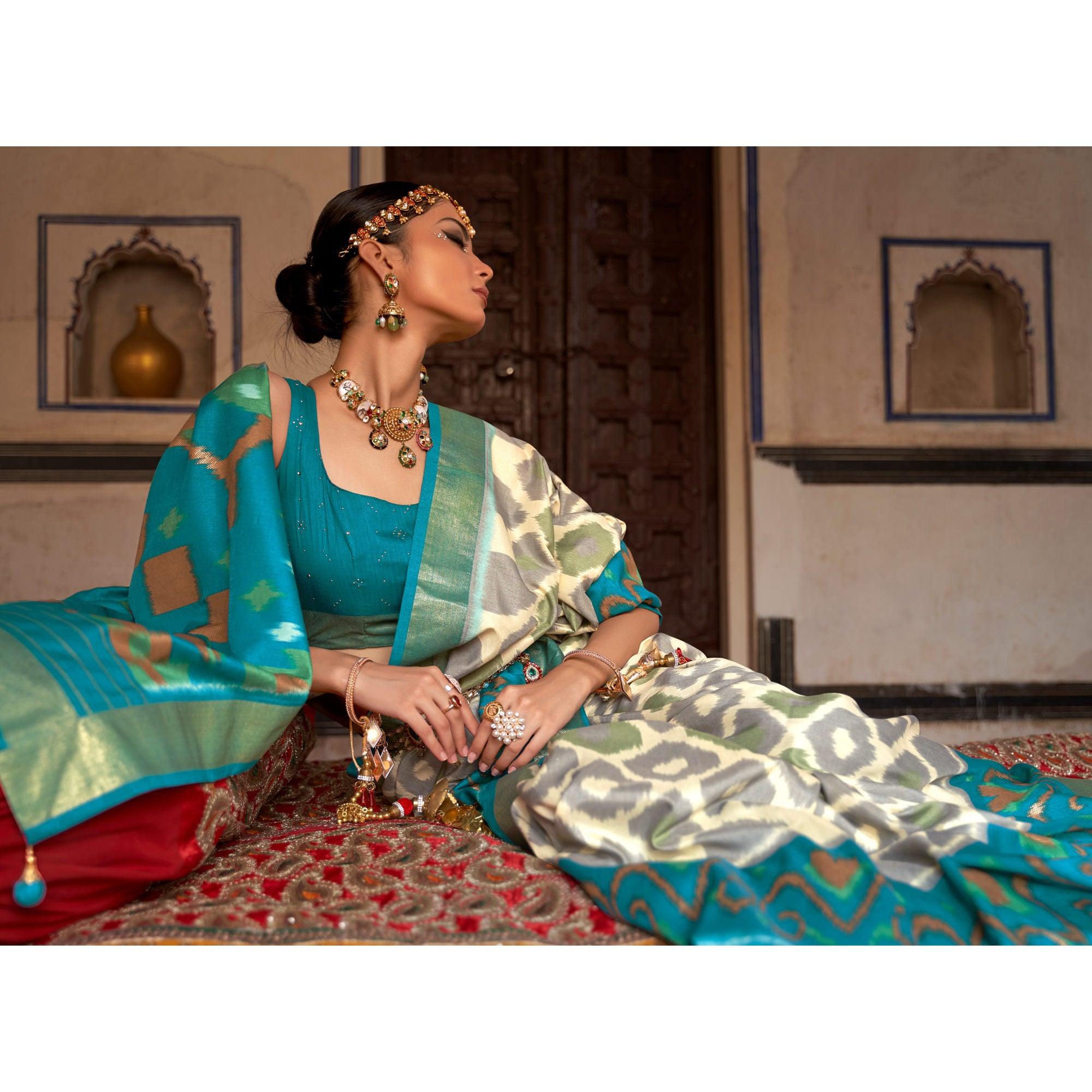 Beige & Light Blue Ikkat Printed-Woven Patola Art Silk Saree - Peachmode