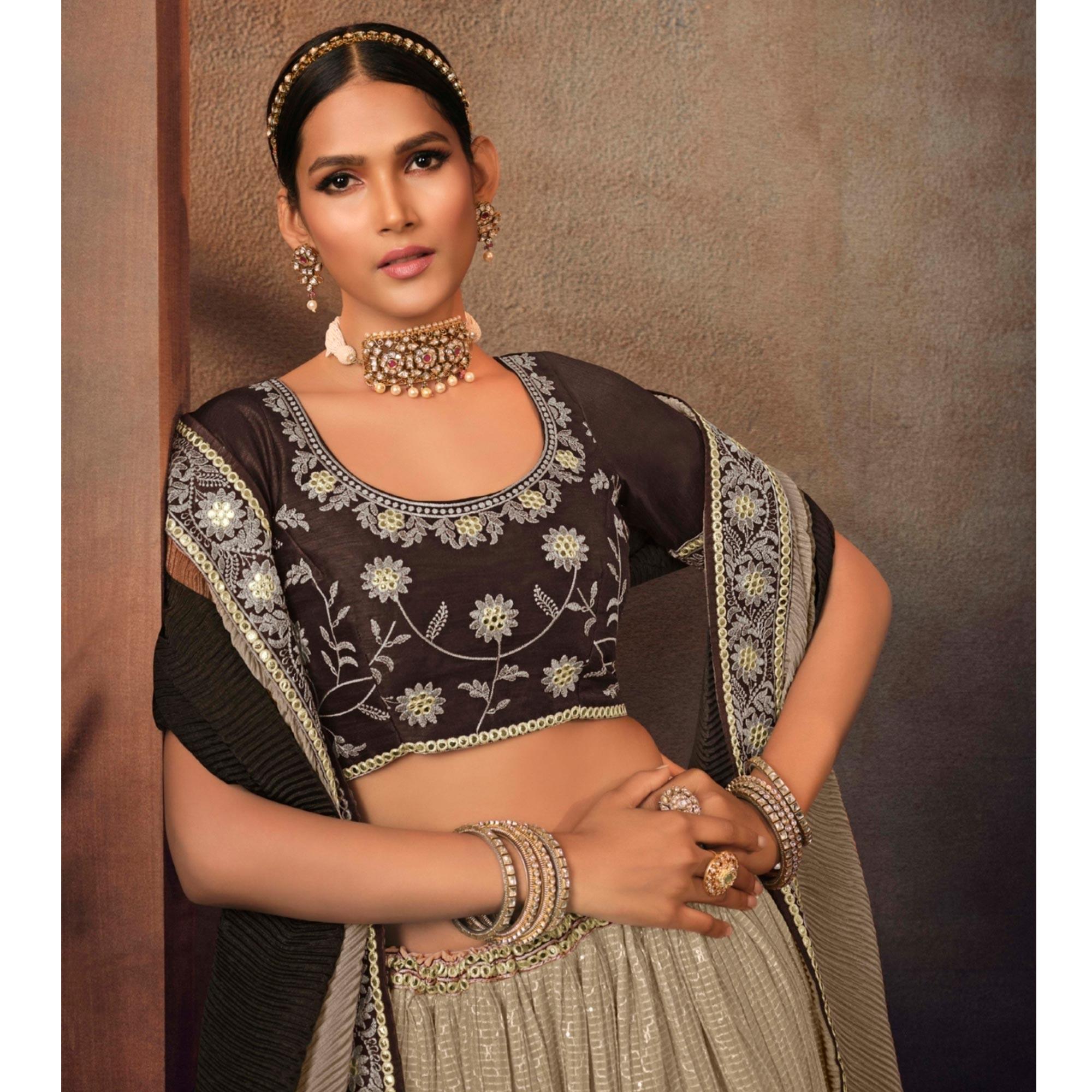 Beige Embroidered Chiffon Lehenga Choli - Peachmode