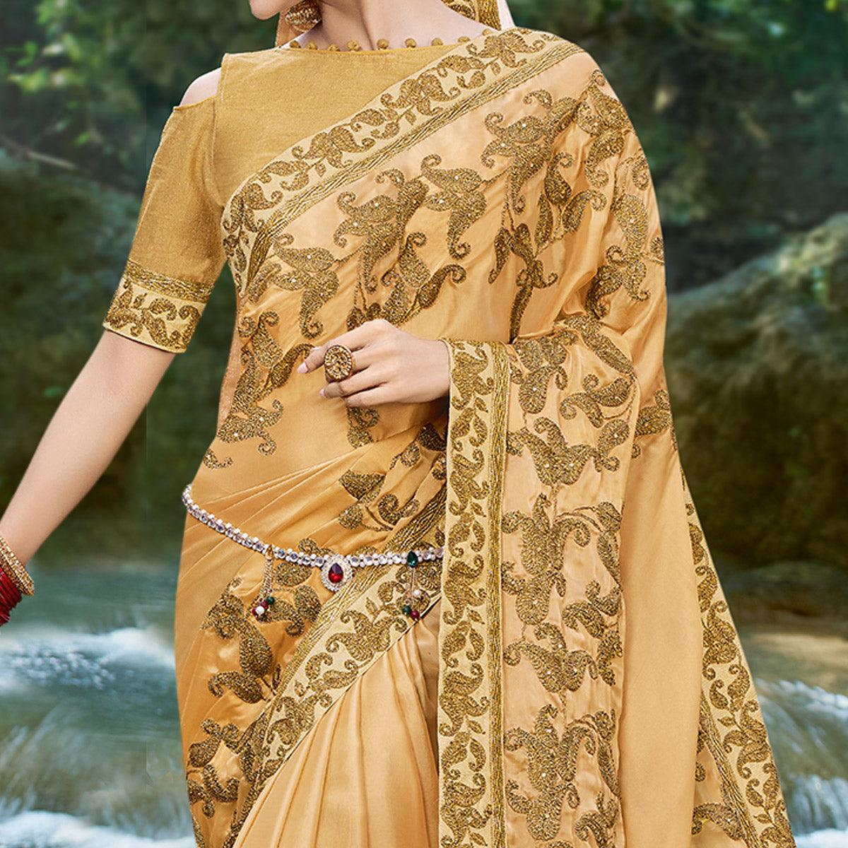 Beige Embroidered Georgette Saree - Peachmode