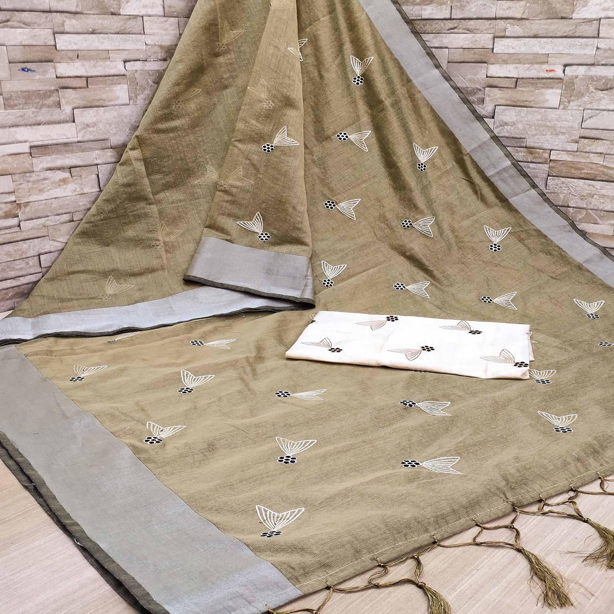 Beige Festive Wear Embroidered Cotton Saree With Tassels - Peachmode