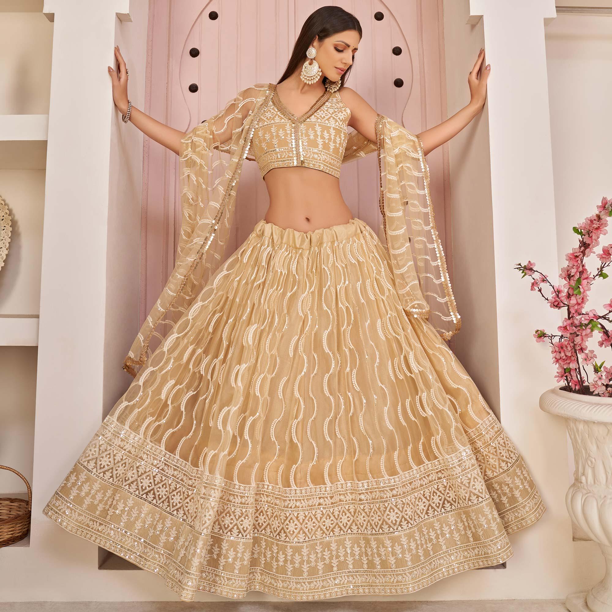 Beige Festive Wear Embroidered Mono Net Lehenga Choli - Peachmode