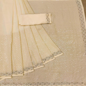 Beige Festive Wear Embroidery With Embellished Georgette Saree - Peachmode