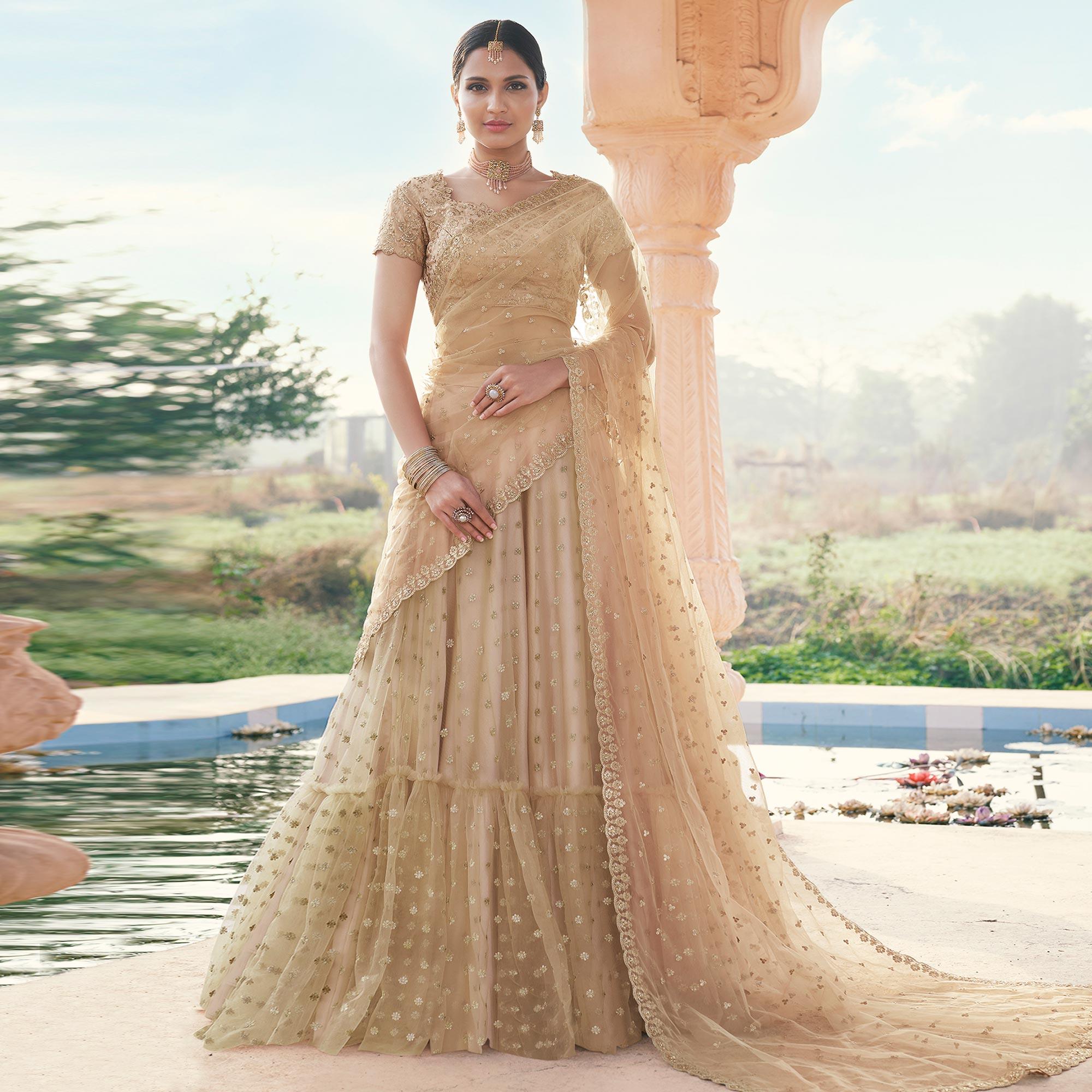 Beige Partywear Floral Embroidered With Zari Net Lehenga Choli - Peachmode