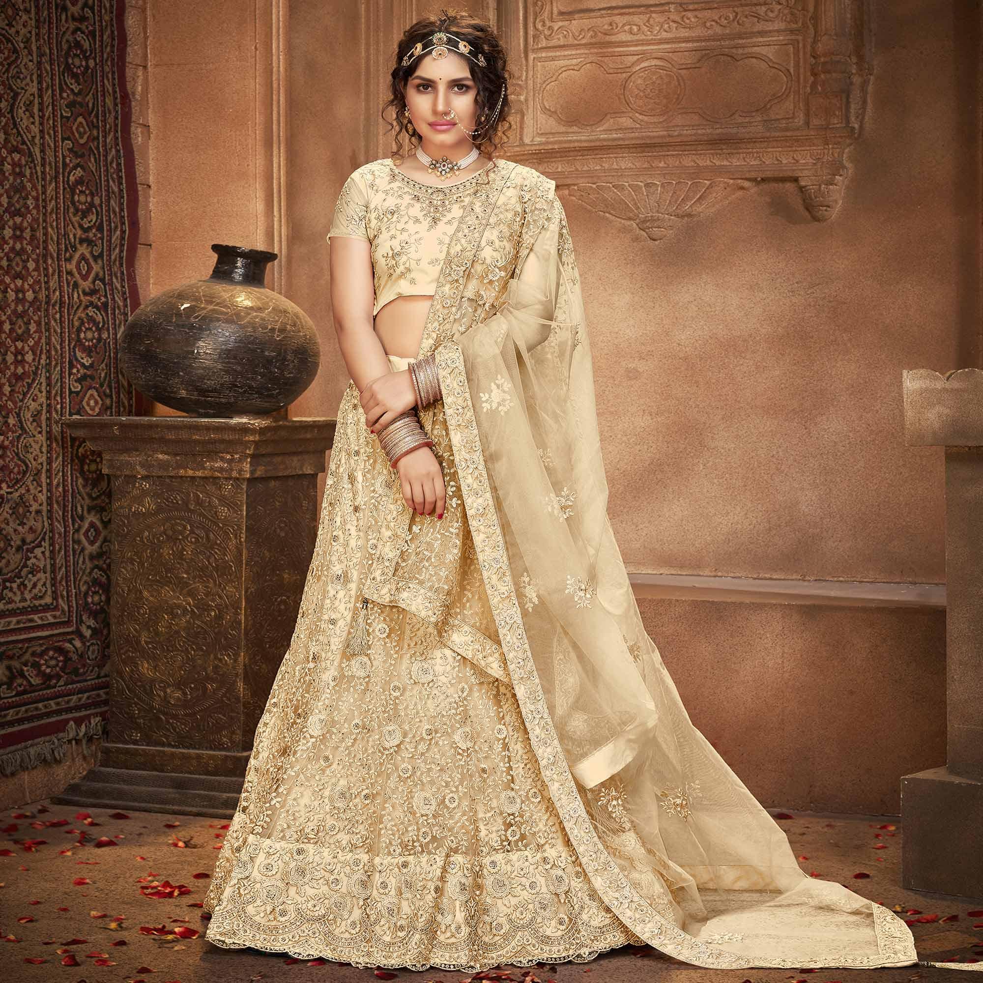 Beige Partywear Multi Sequence Embroidered Net Lehenga Choli - Peachmode
