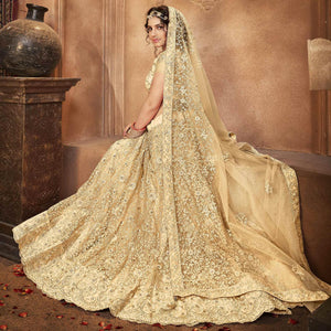 Beige Partywear Multi Sequence Embroidered Net Lehenga Choli - Peachmode