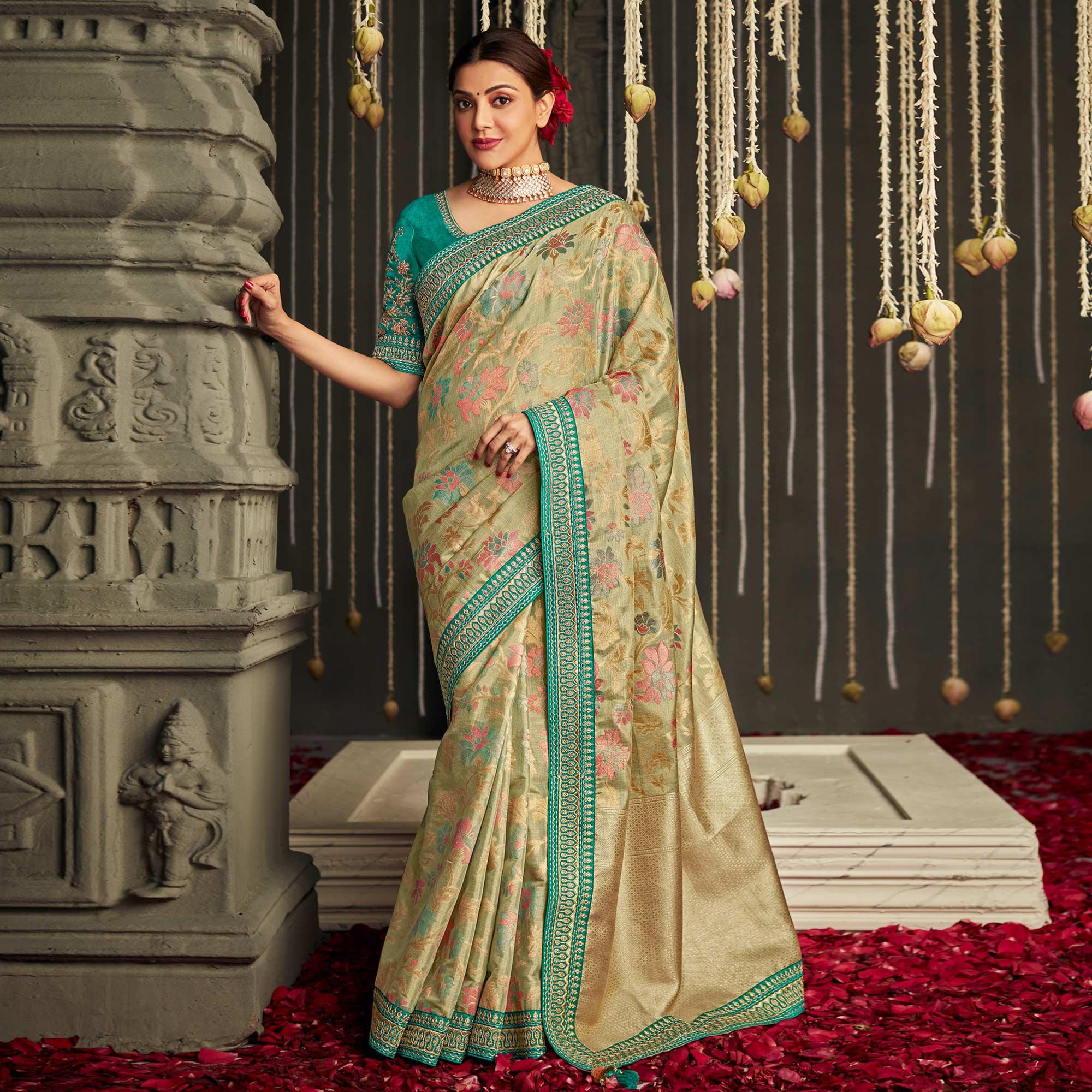 Beige Woven Art Silk Saree With Tassels - Peachmode