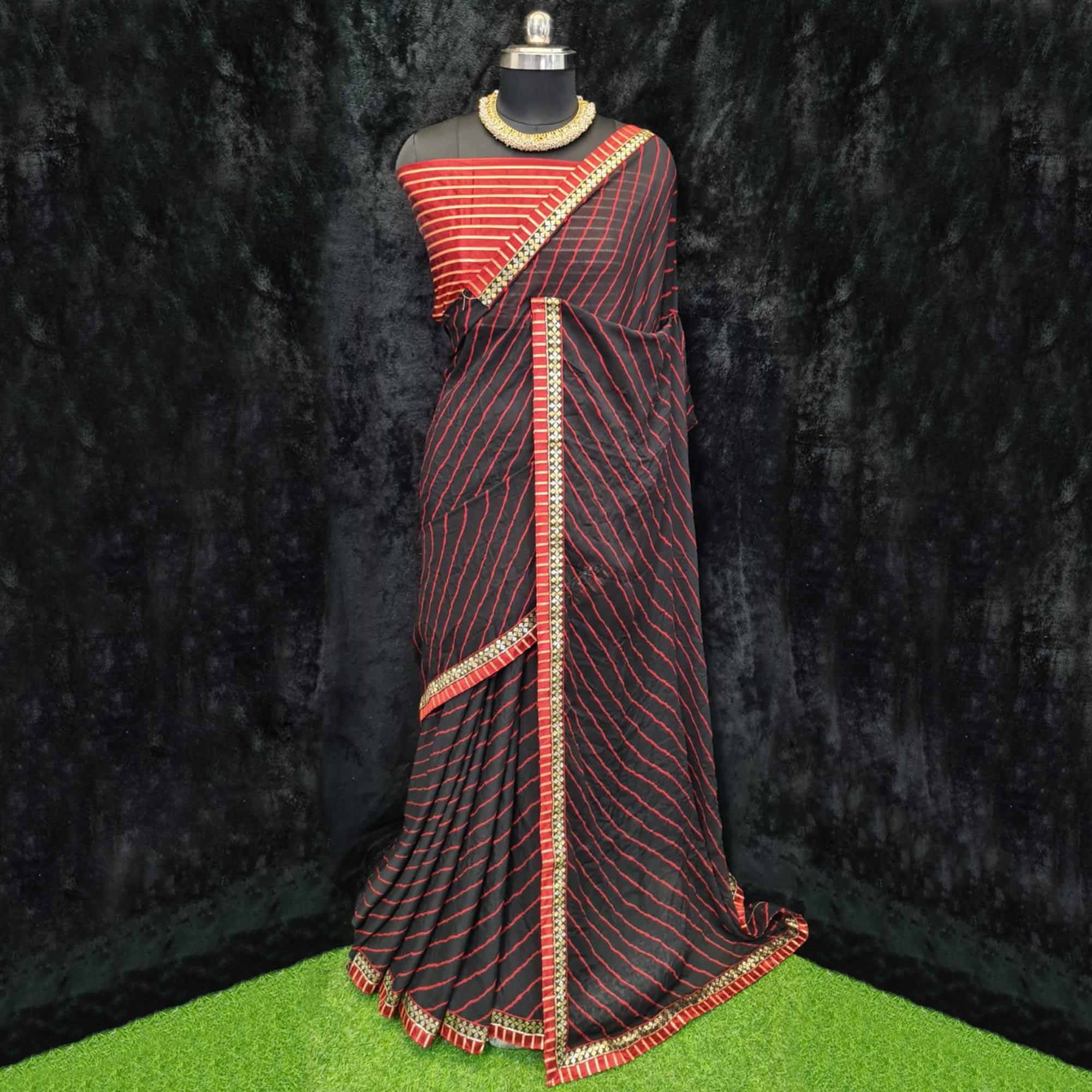 Black Casual Wear Printed Georgette Saree With Lace Border - Peachmode