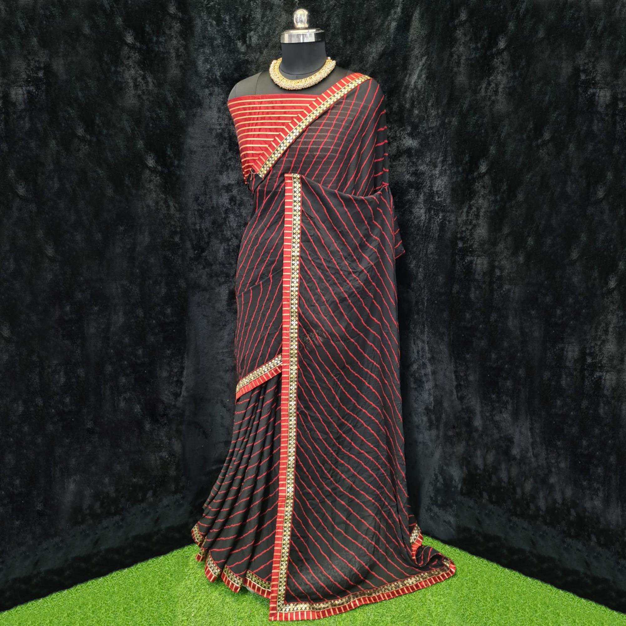 Black Casual Wear Printed Georgette Saree With Lace Border - Peachmode