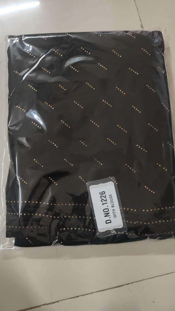 Black Embellished Georgette Saree - Peachmode