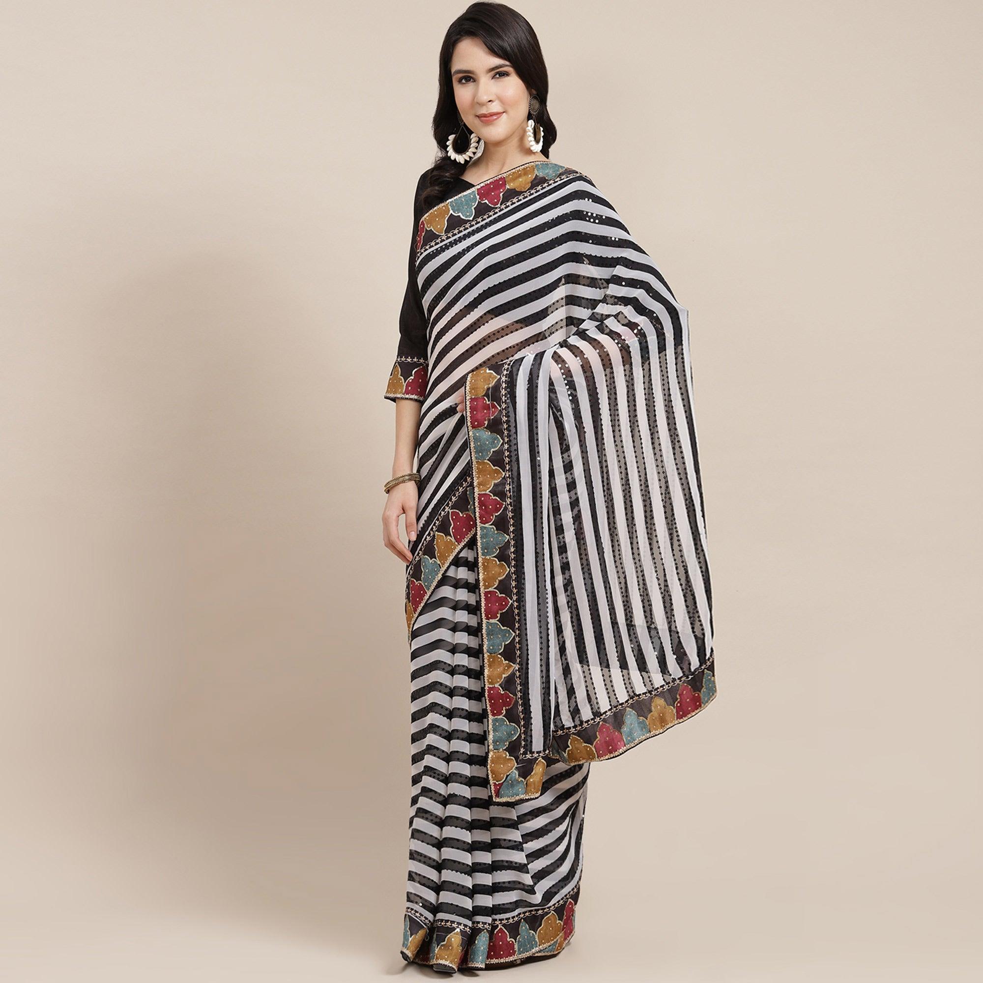 Black-Off White Sequins With Striped Printed Georgette Saree - Peachmode