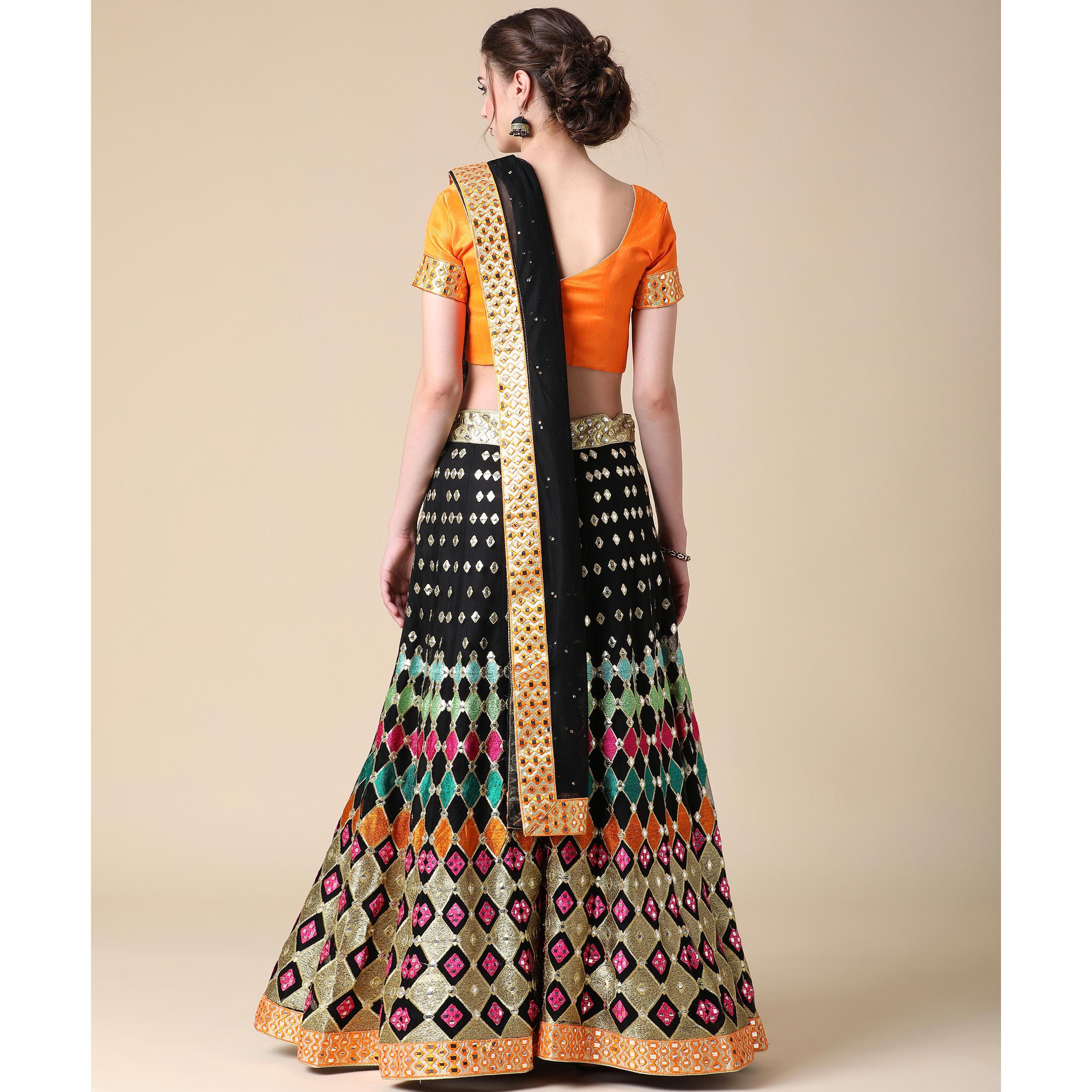 Black Partywear Embroidered & Mirror Work Heavy Soft Net Lehenga - Peachmode