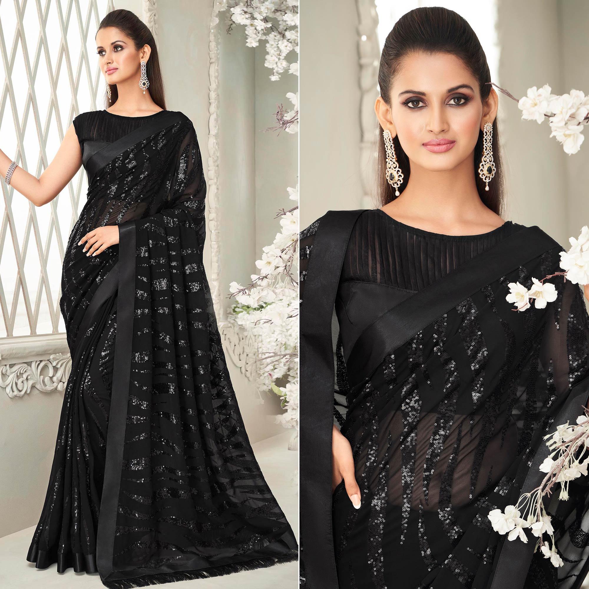 Black Sequence Embroidered Georgette Saree With Tassels - Peachmode