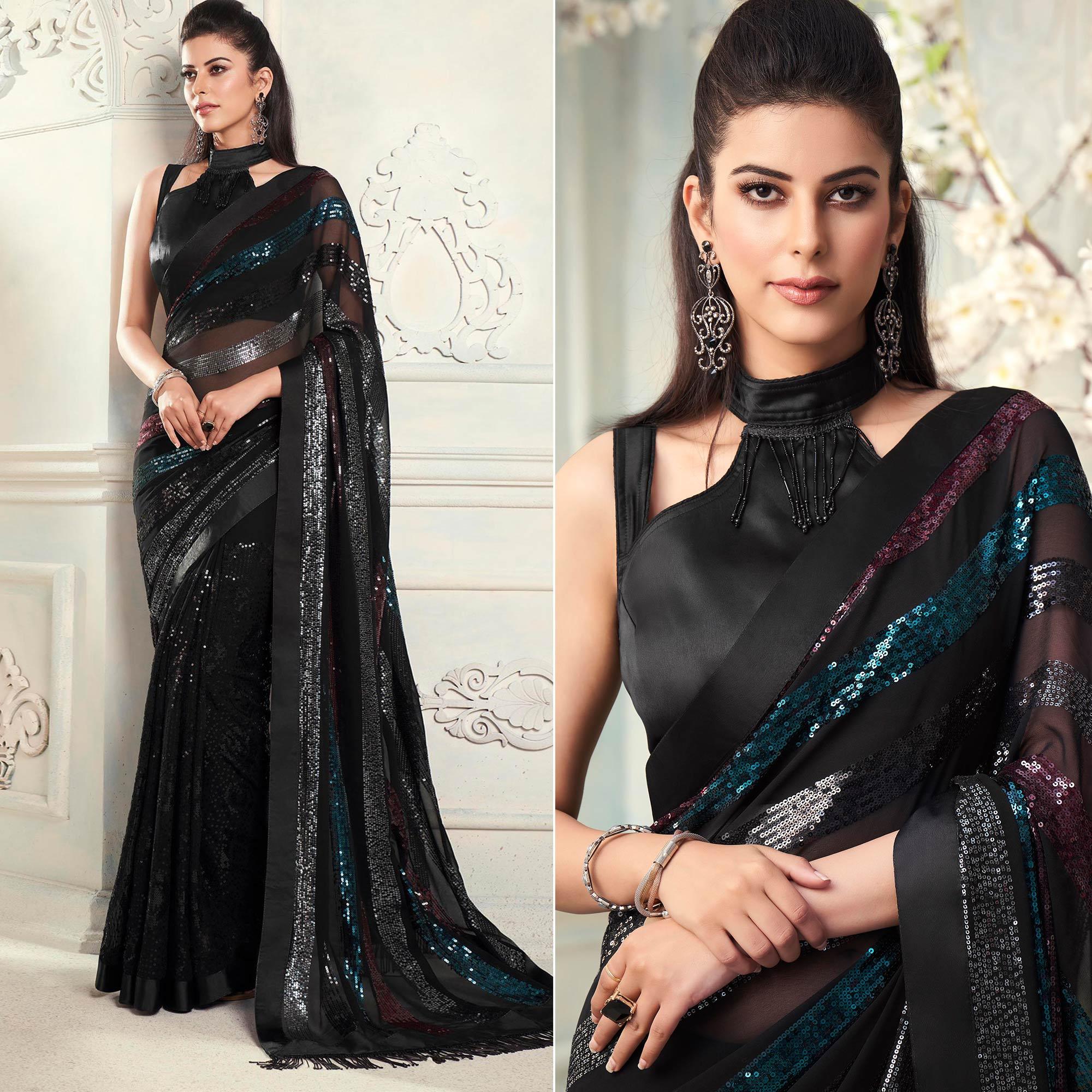 Black Sequence Embroidered Georgette Saree With Tassels - Peachmode