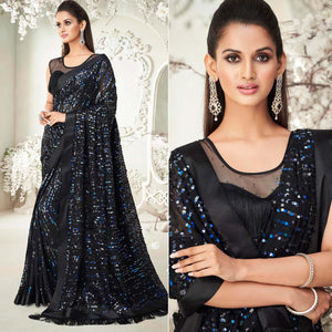 Black Sequence Embroidered Georgette Saree With Tassels - Peachmode