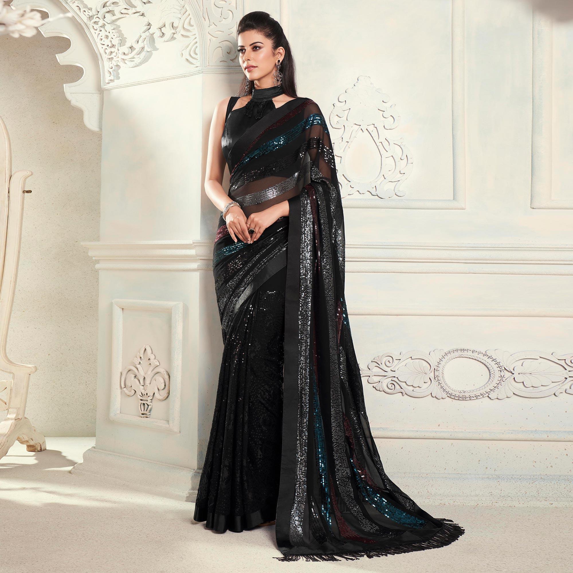 Black Sequence Embroidered Georgette Saree With Tassels - Peachmode