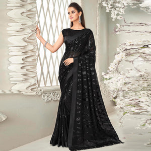 Black Sequence Embroidered Georgette Saree With Tassels - Peachmode