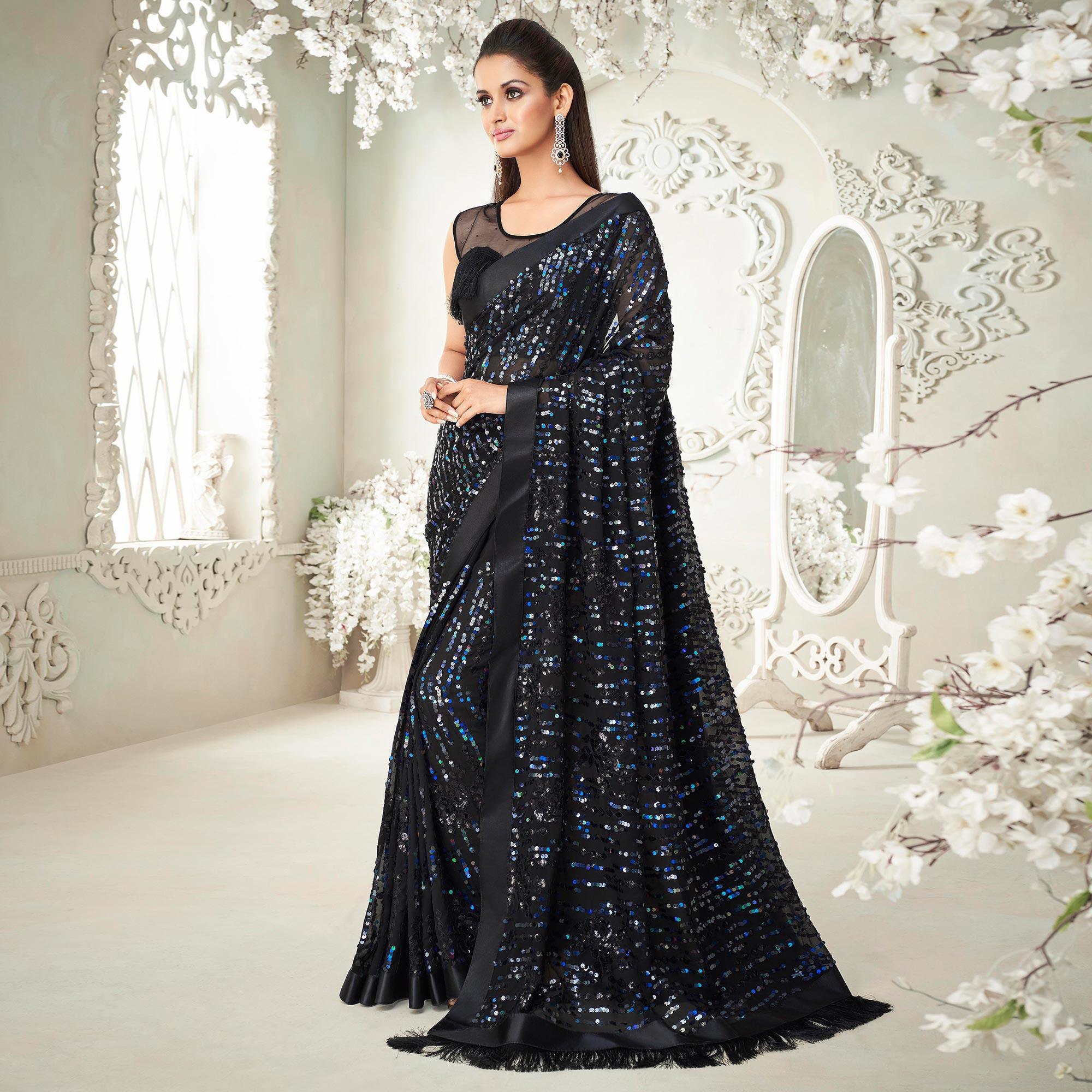 Black Sequence Embroidered Georgette Saree With Tassels - Peachmode