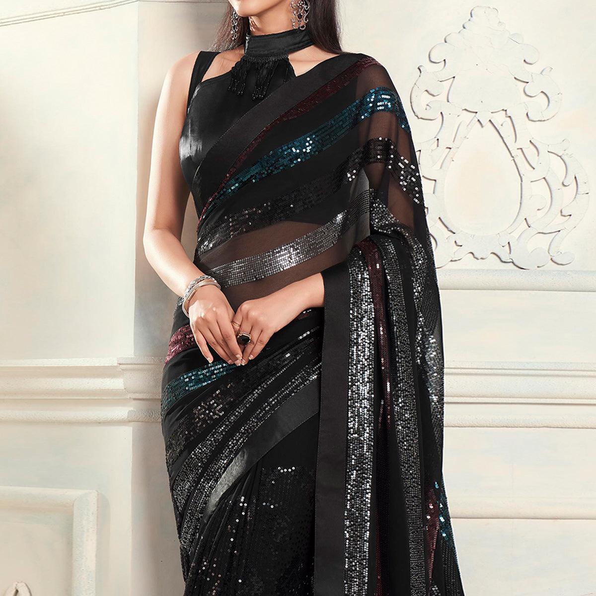 Black Sequence Embroidered Georgette Saree With Tassels - Peachmode