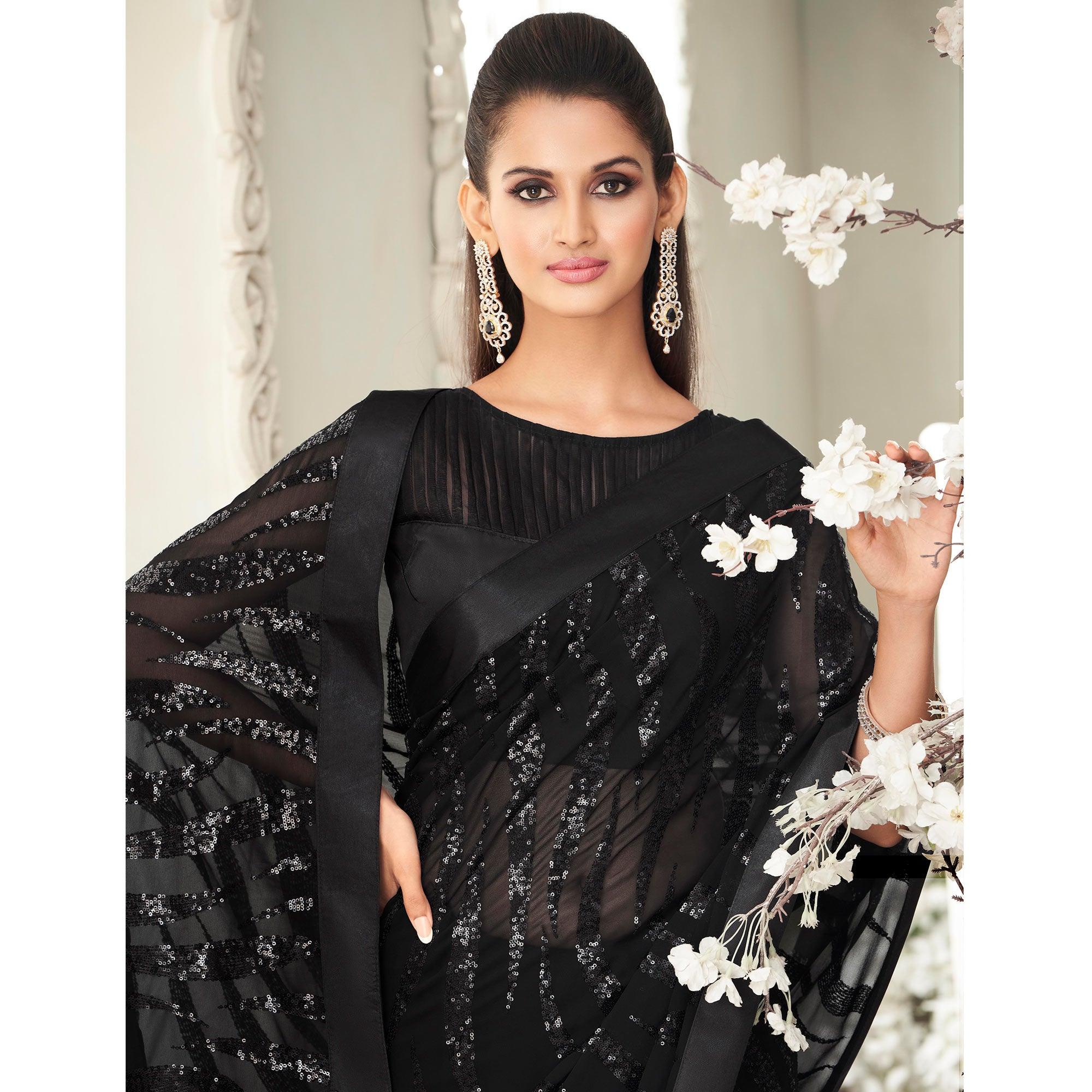 Black Sequence Embroidered Georgette Saree With Tassels - Peachmode