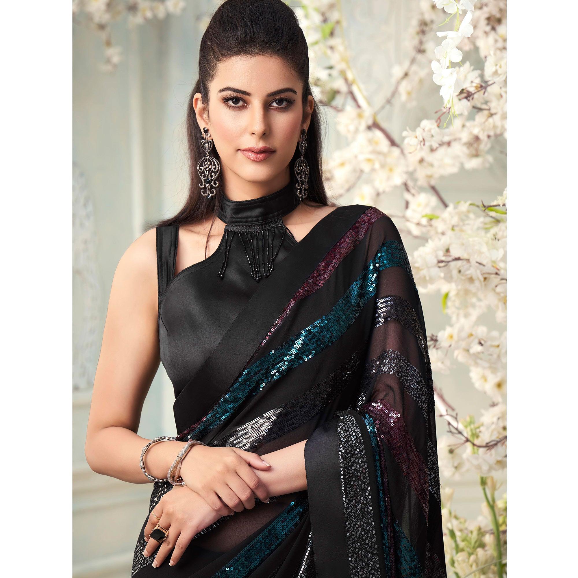 Black Sequence Embroidered Georgette Saree With Tassels - Peachmode