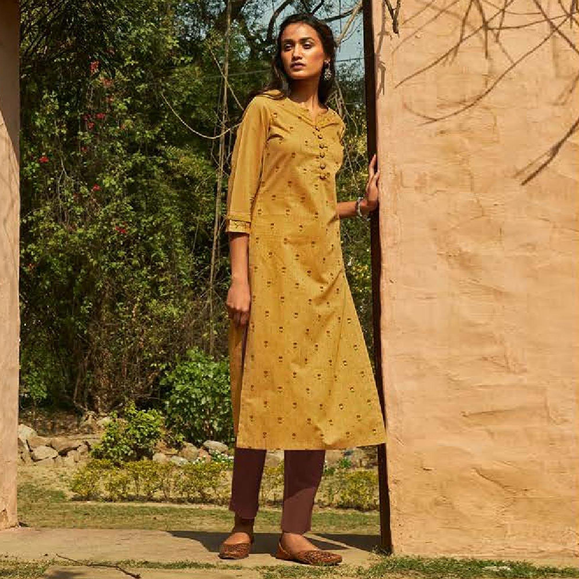 Blissful Beige Colored Casual Wear Embroidered Cotton Kurti With Bottom - Peachmode