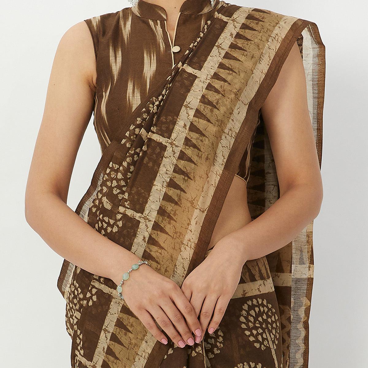 Blissful Brown Colored Casual Wear Floral Printed Linen Silk Saree - Peachmode