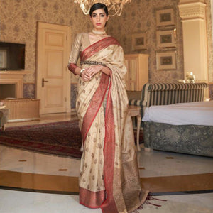 Blissful Cream Colored Festive Wear Woven Silk Saree - Peachmode