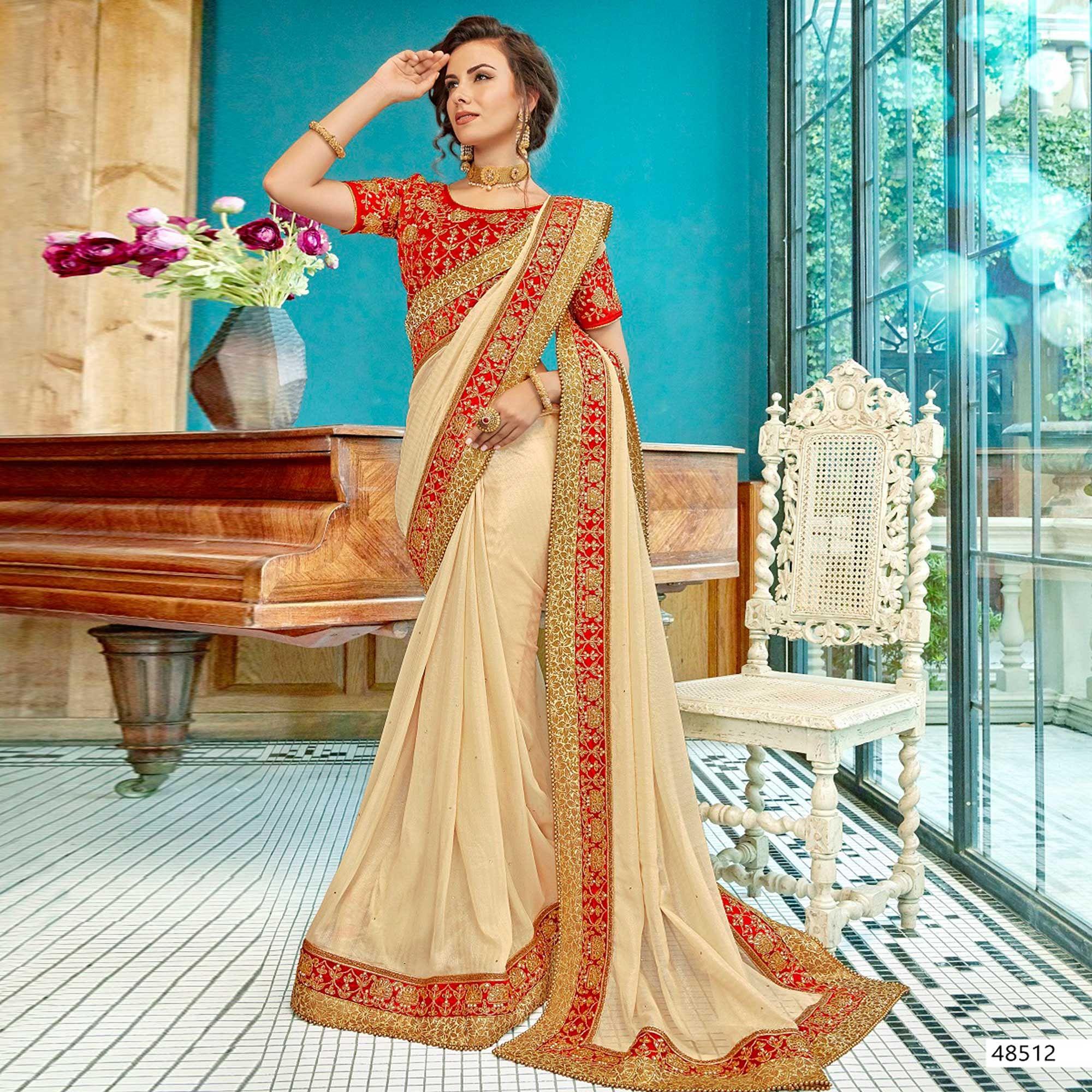 Blissful Cream Colored Partywear Embroidered Georgette Saree - Peachmode