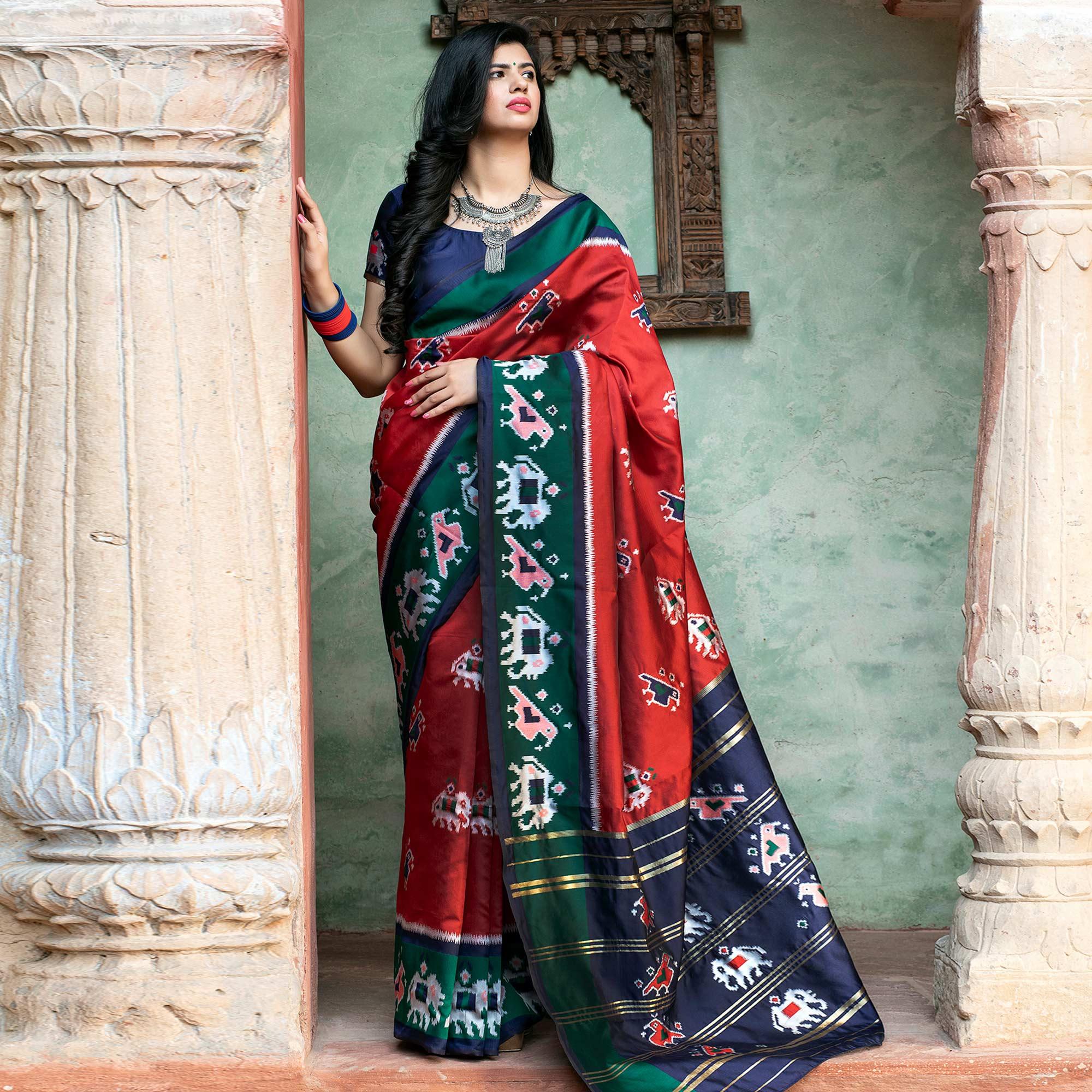 Blissful Red Colored Festive Wear Woven Patola Silk Saree - Peachmode