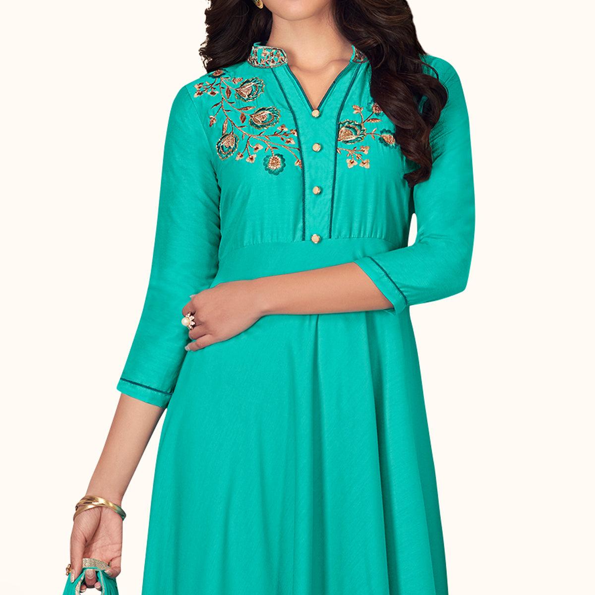 Blissful Turquoise Colored Partywear Embroidered Cotton Palazzo Suit - Peachmode