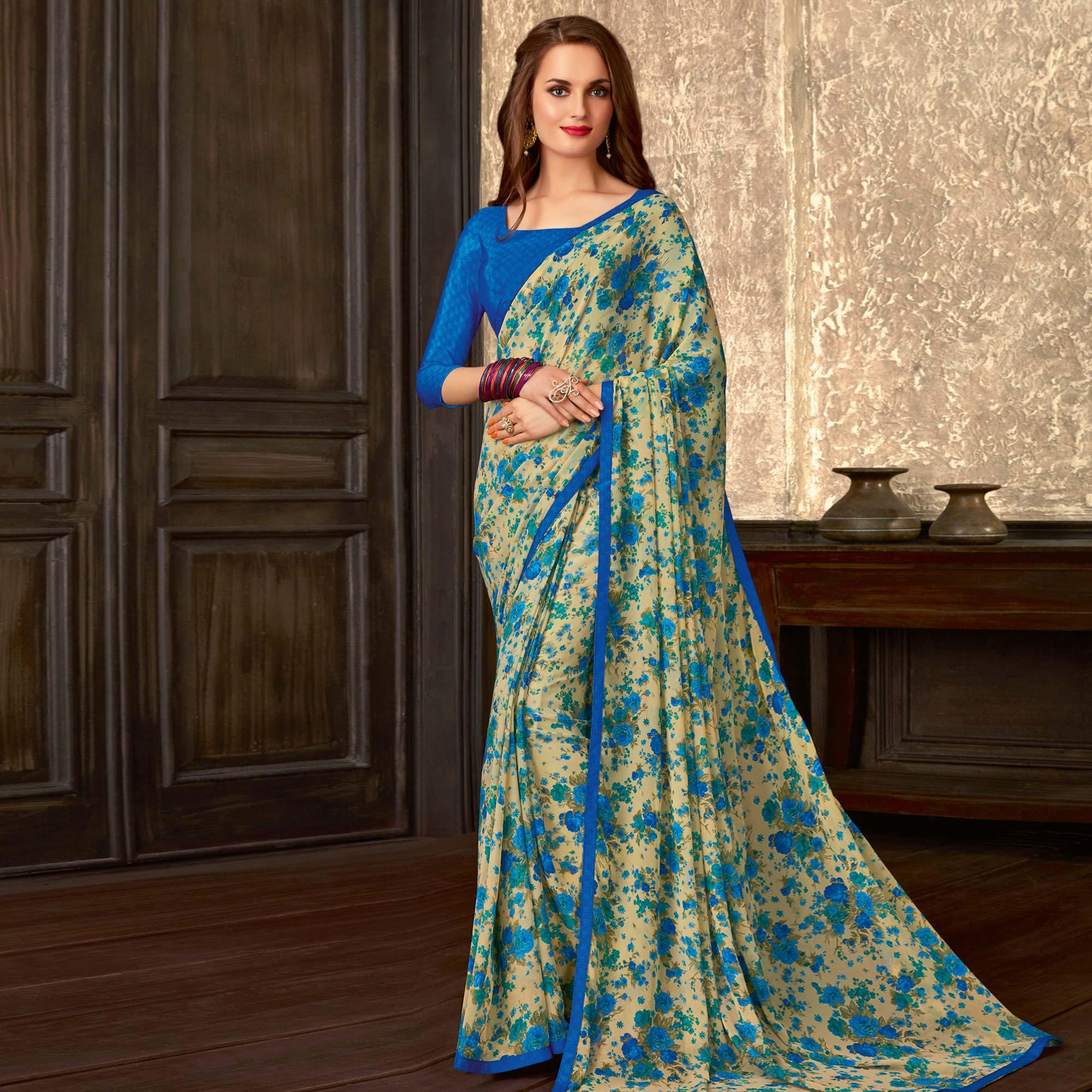 Blooming Beige-Blue Colored Casual Wear Floral Printed Georgette Saree - Peachmode