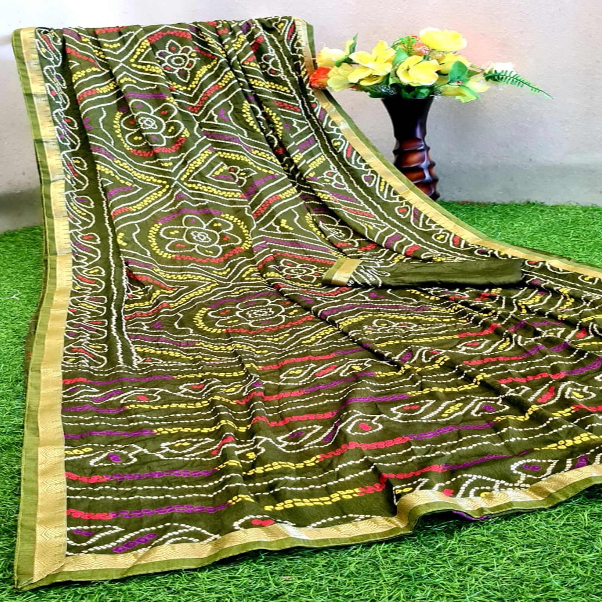 Blooming Mehendi Green Colored Festive Wear Woven Moss Georgette Saree - Peachmode