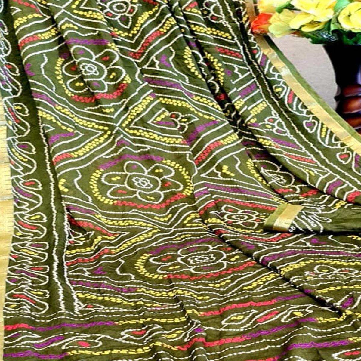 Blooming Mehendi Green Colored Festive Wear Woven Moss Georgette Saree - Peachmode