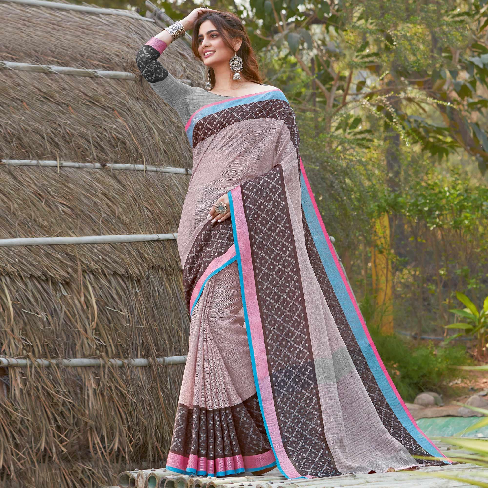 Blooming Pink Colored Festive Wear Woven Linen Saree - Peachmode