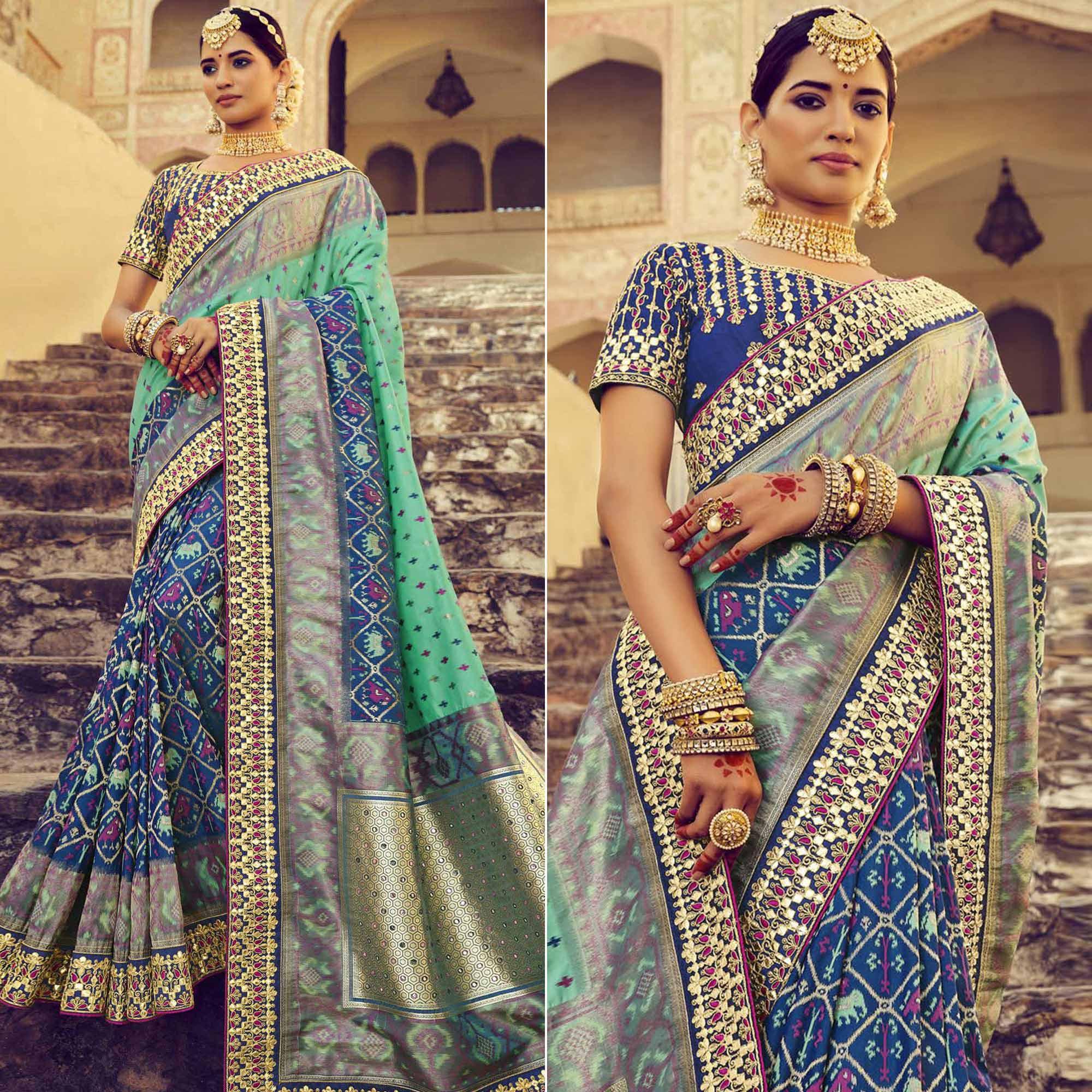 Blue & Turquoise Wedding Wear Resham With Embellished Silk Patola Saree - Peachmode