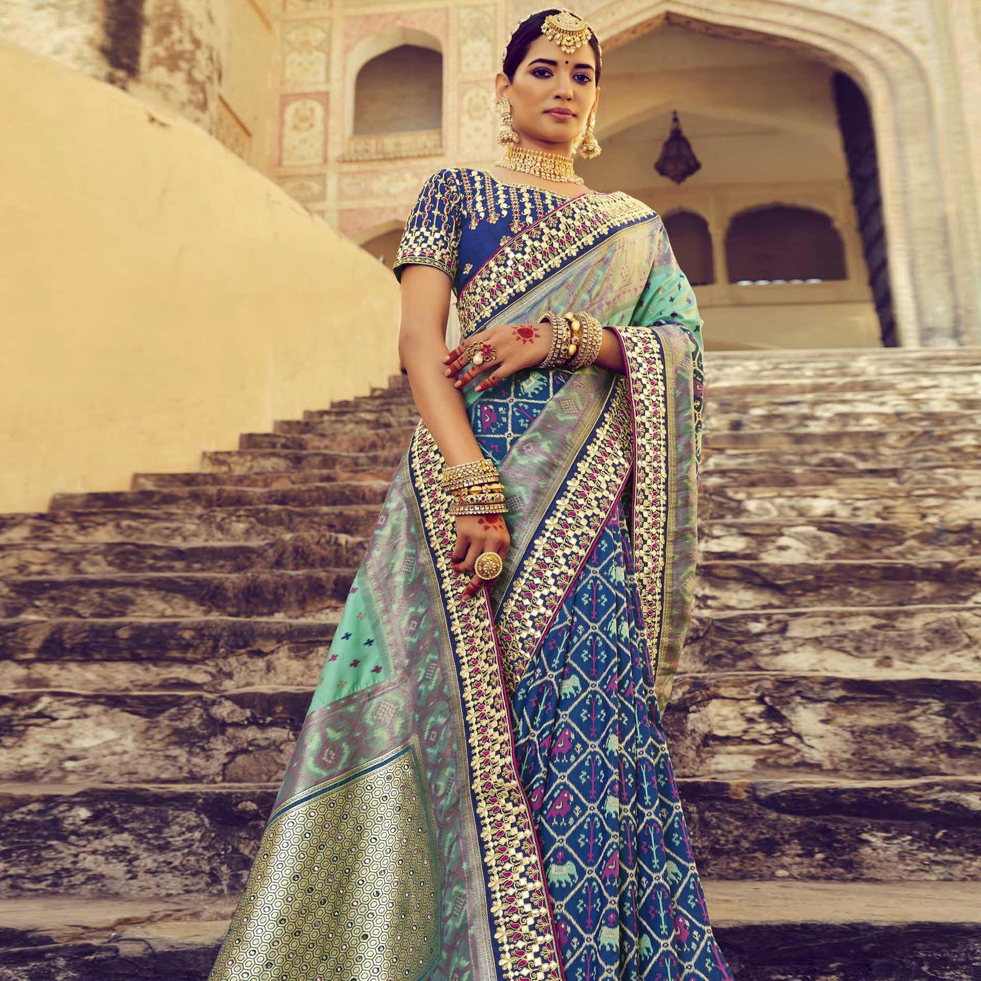 Blue & Turquoise Wedding Wear Resham With Embellished Silk Patola Saree - Peachmode