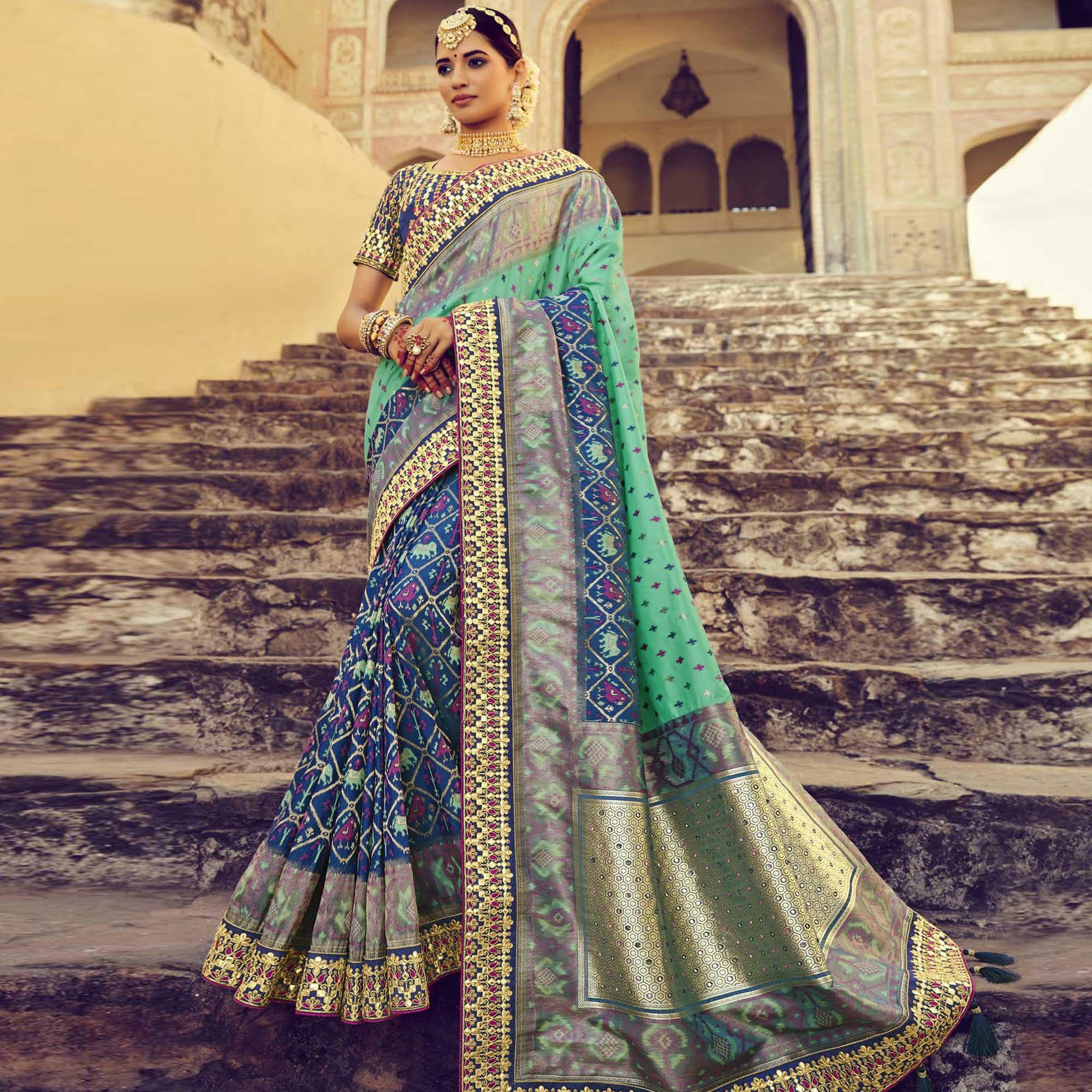 Blue & Turquoise Wedding Wear Resham With Embellished Silk Patola Saree - Peachmode
