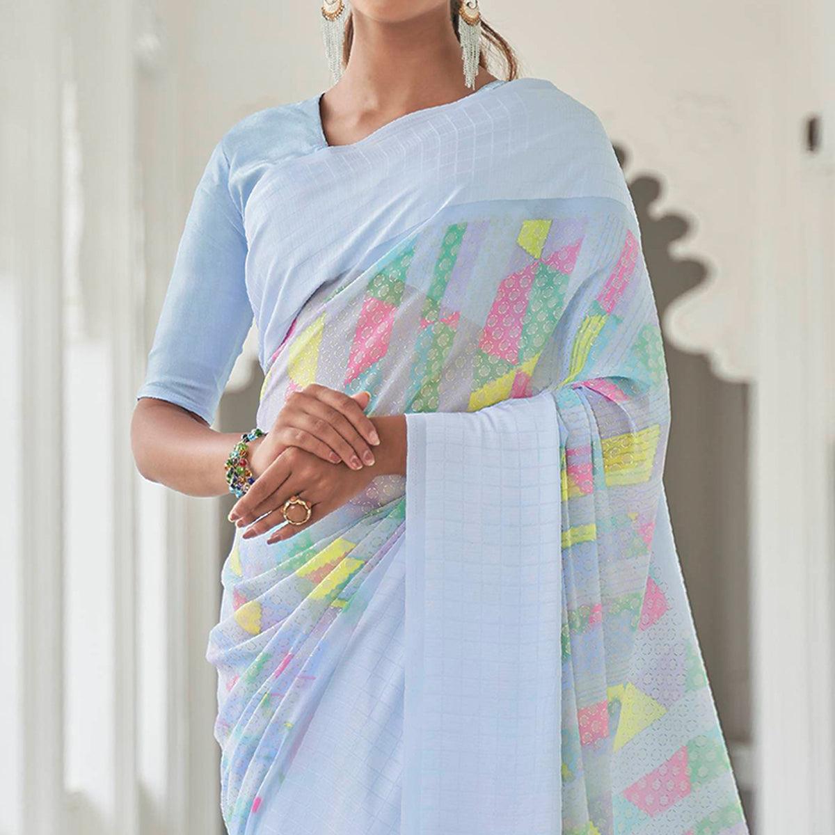 Blue Casual Wear Foil Printed Georgette Saree With Jacquard Border - Peachmode