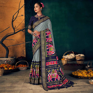 Blue Festive Wear Striped Printed With Foil Border Dola Silk Saree - Peachmode