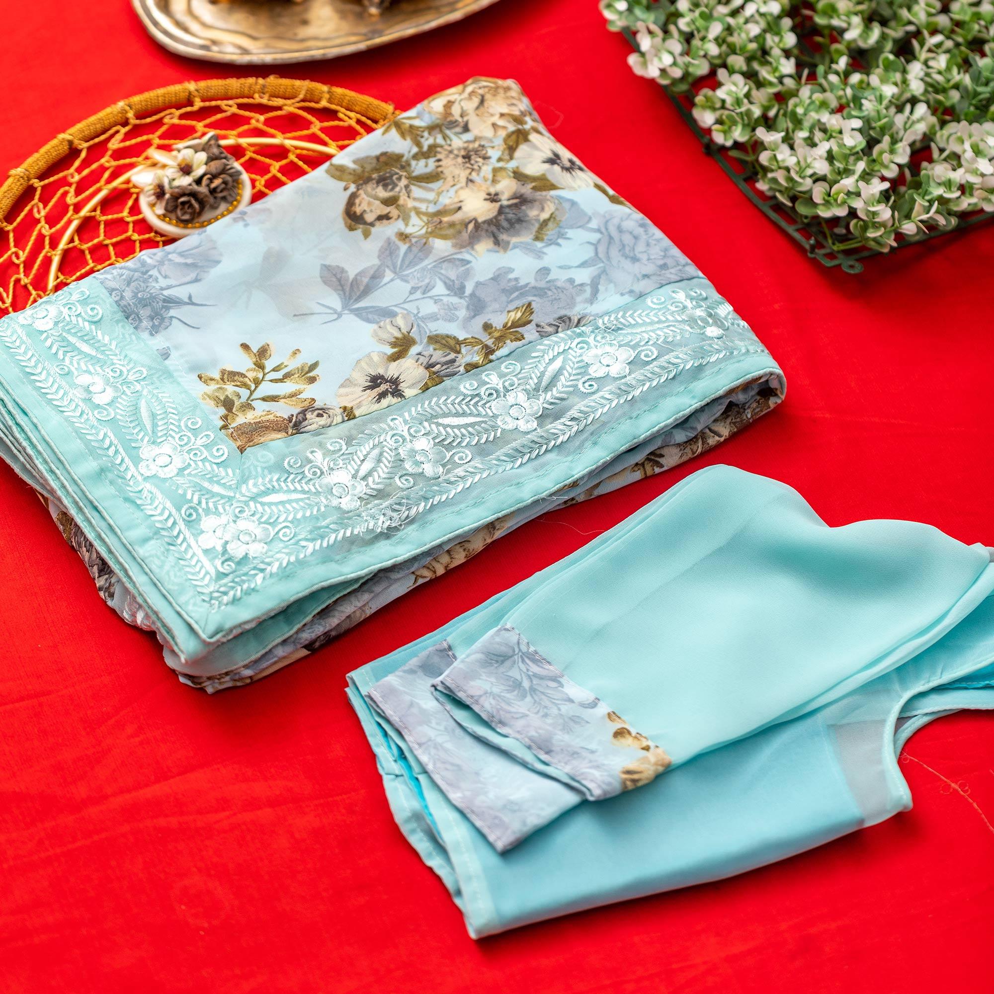 Blue Floral Printed With Embroidered Border Georgette Saree - Peachmode