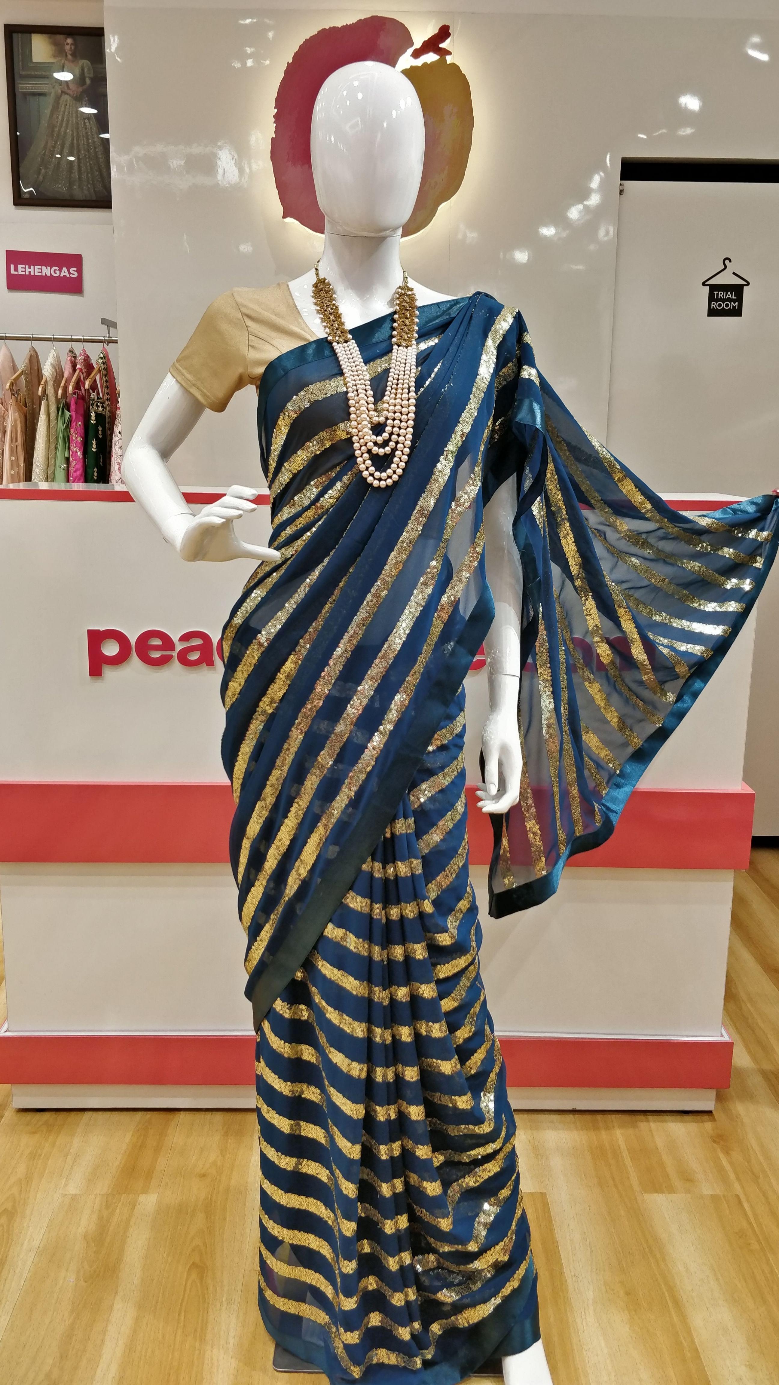 Blue Partywear Embellished With Sequins Georgette Saree - Peachmode