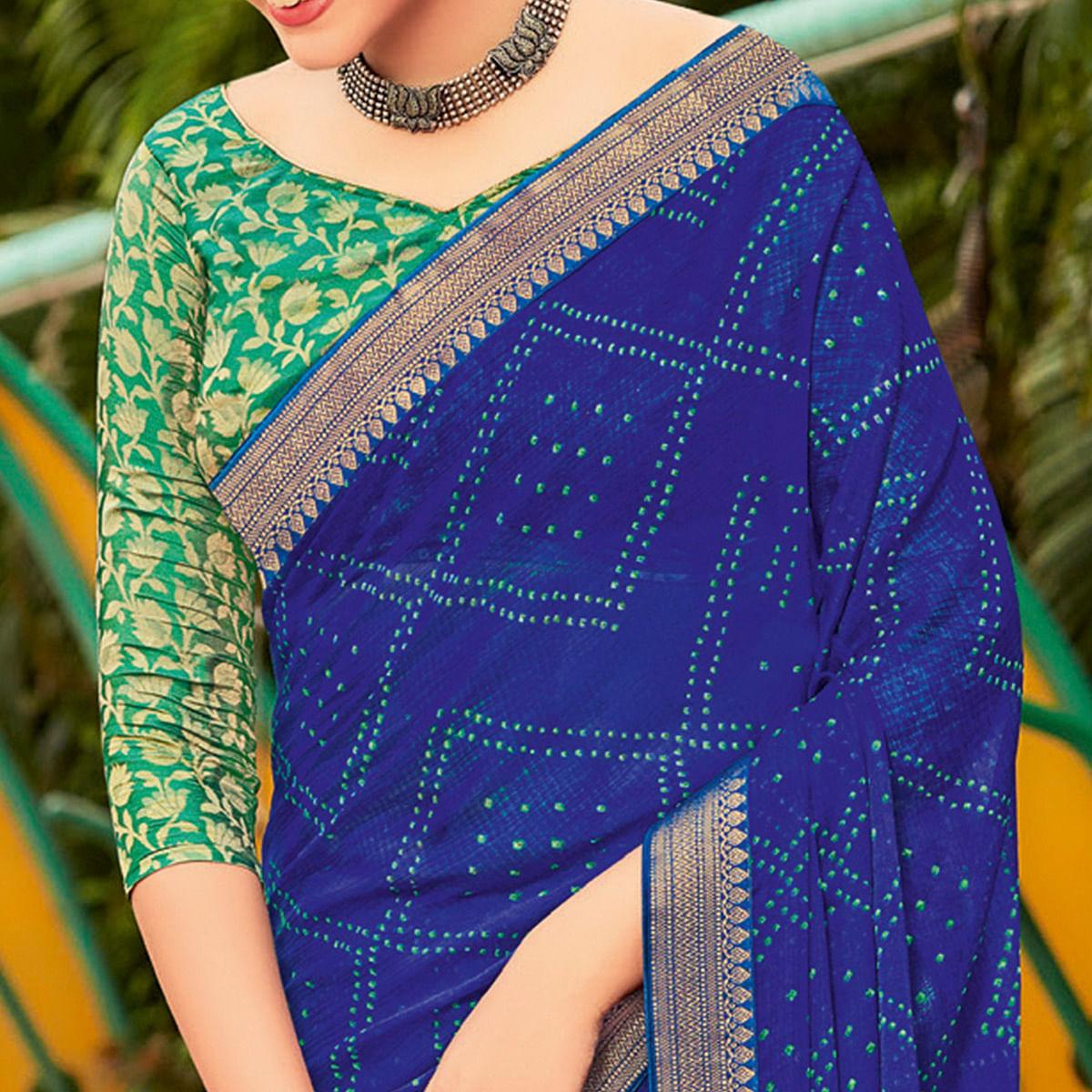 Blue Partywear Printed Chiffon Saree With Border - Peachmode