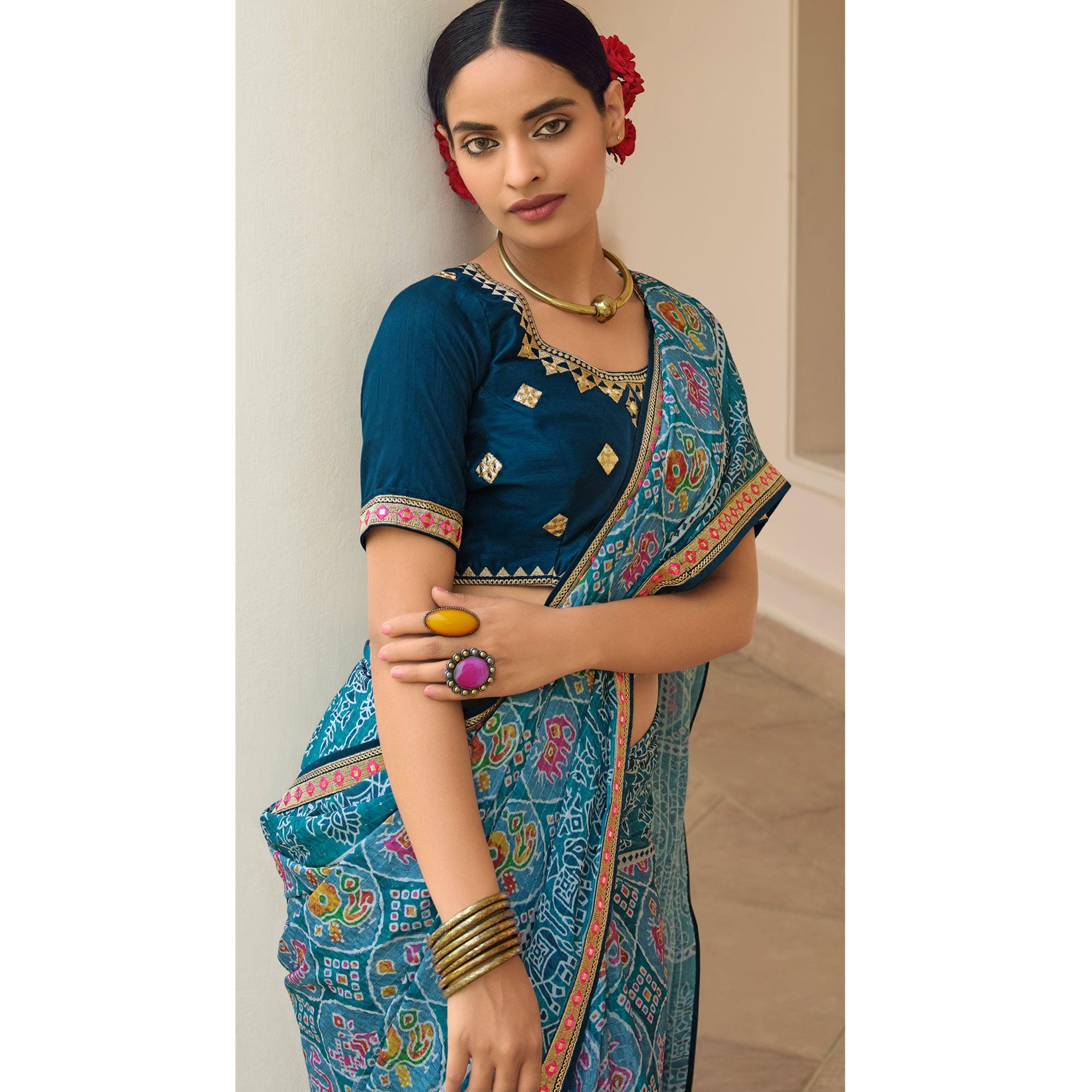 Blue Printed With Embellished Chiffon Saree With Tassels - Peachmode